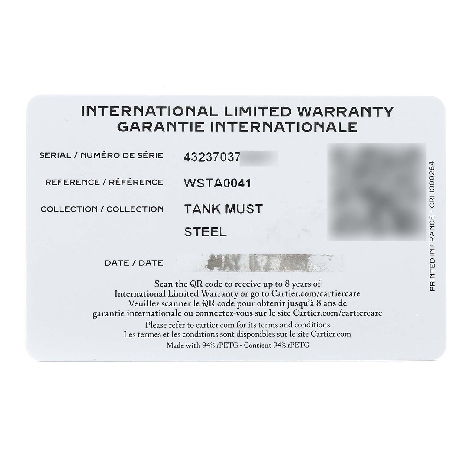 The image shows an international limited warranty card for the Cartier Tank Must WSTA0041 Women's Stainless Steel Silver Dial WSTA0041 Women's Stainless Steel Silver Dial watch model.