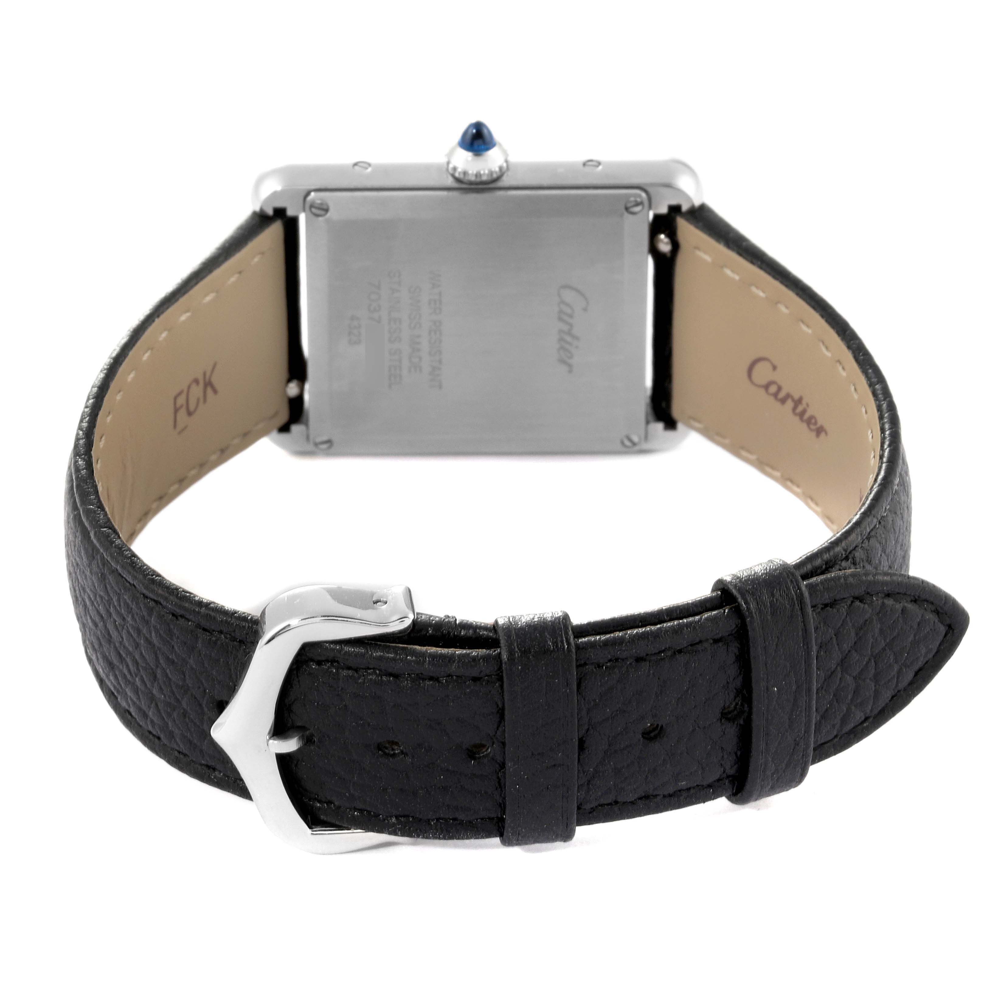 This image shows the back case and leather strap of the Cartier Tank Must WSTA0041 Women's Stainless Steel Silver Dial WSTA0041 Women's Stainless Steel Silver Dial watch.