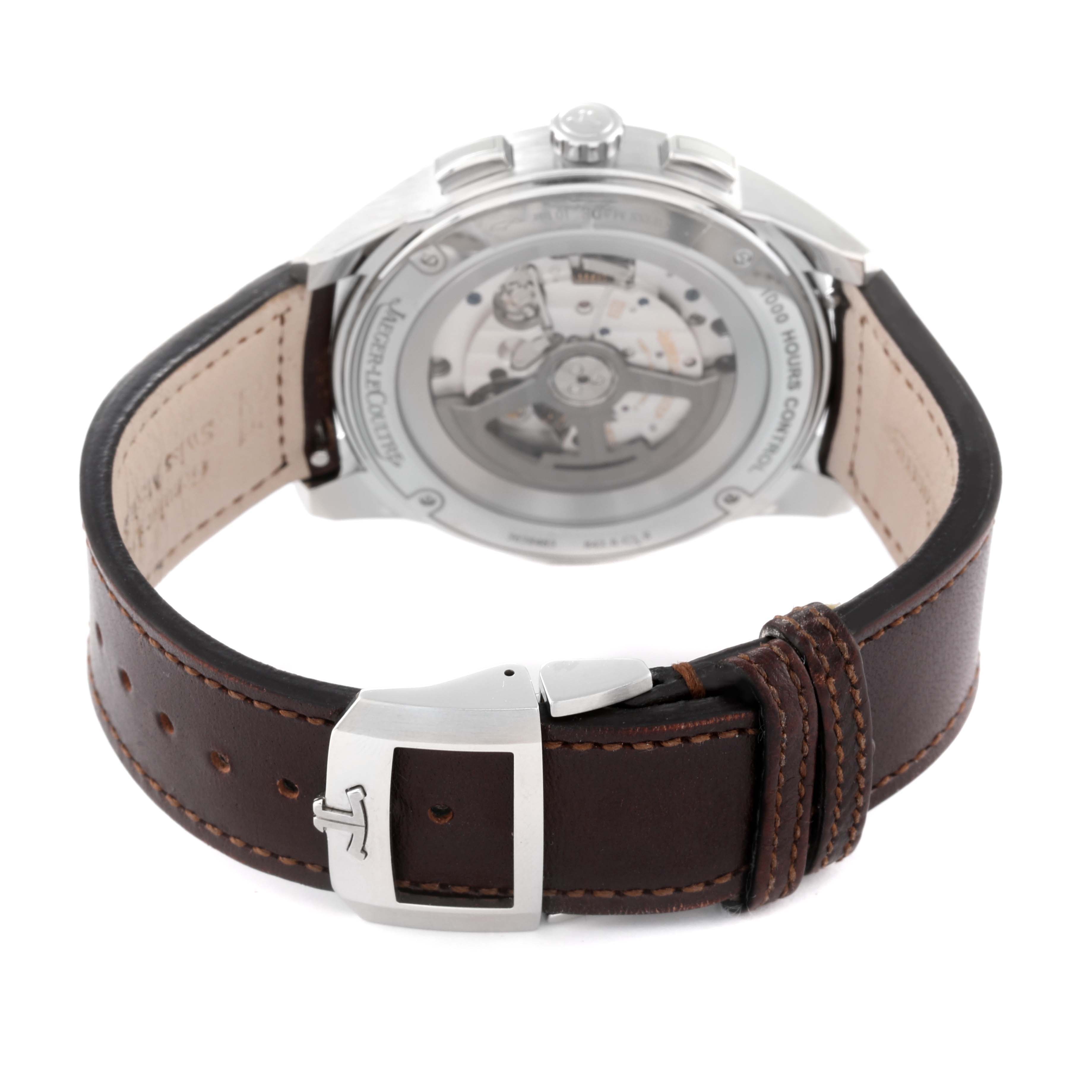 The image shows the back view of a Jaeger-LeCoultre Master model watch, highlighting the movement and brown leather strap with a clasp.