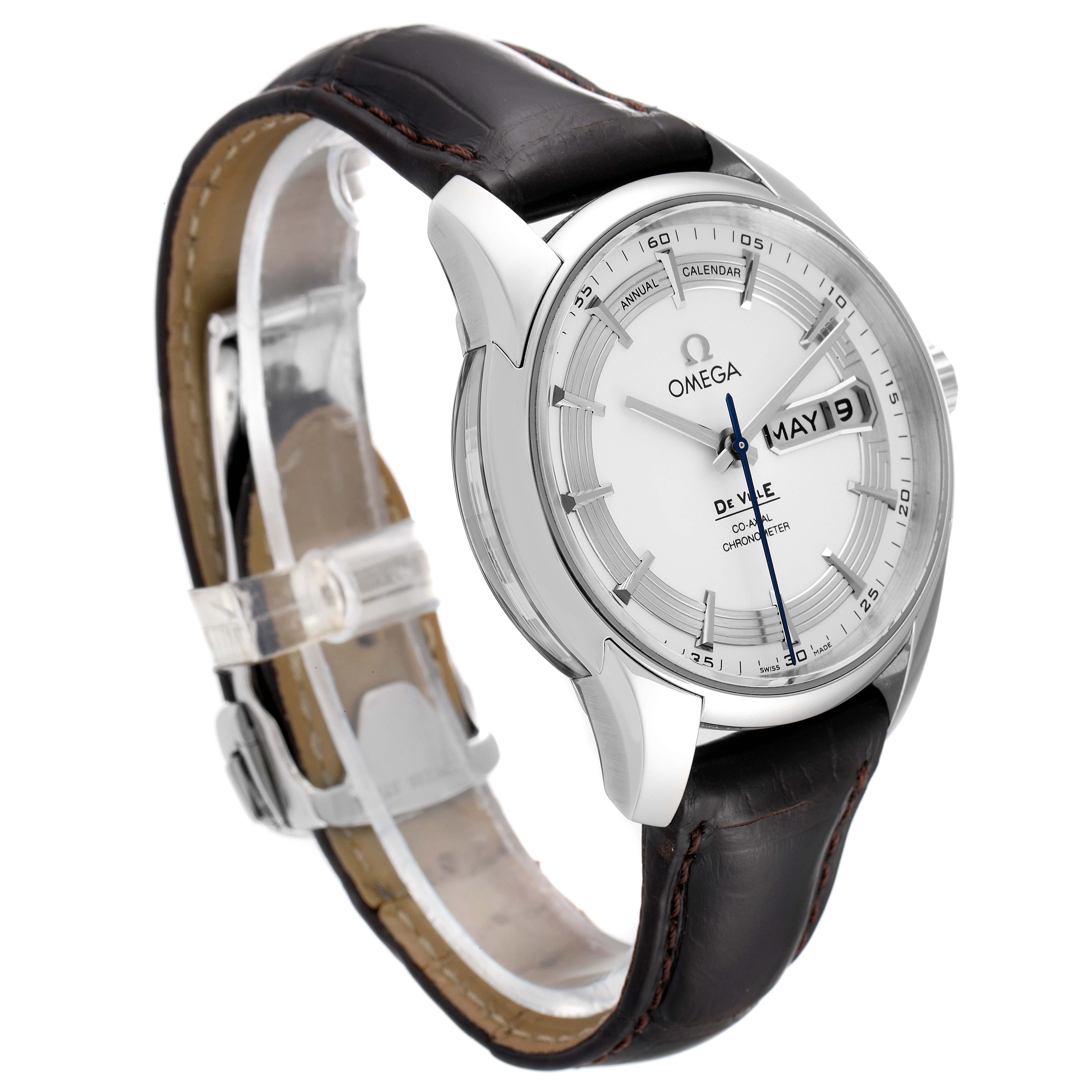 The image shows an angled view of the Omega De Ville 431.33.41.22.02.001 Men's Stainless Steel Silver Dial 431.33.41.22.02.001 Men's Stainless Steel Silver Dial watch, highlighting the dial, leather strap, and day-date display.