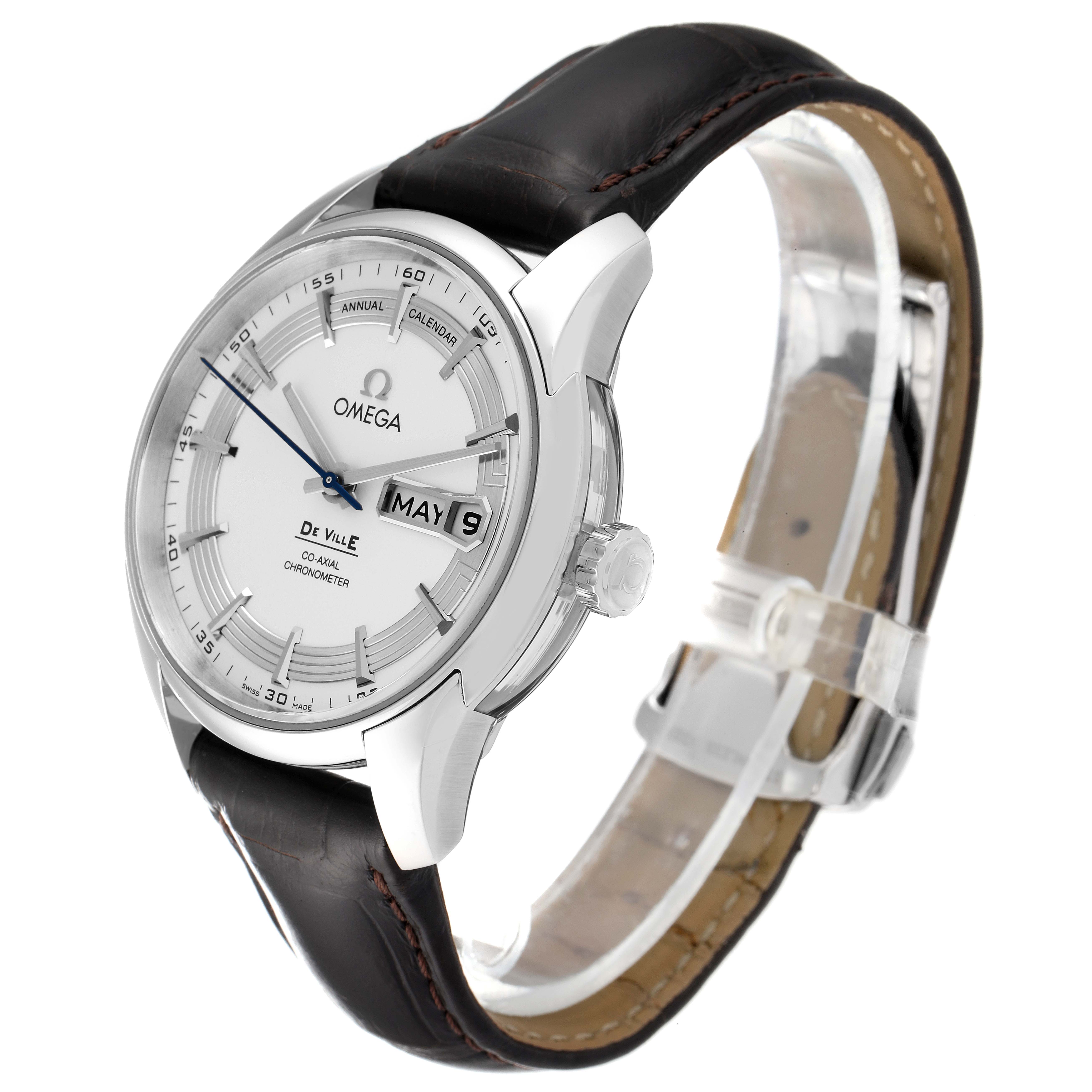 The Omega De Ville 431.33.41.22.02.001 Men's Stainless Steel Silver Dial 431.33.41.22.02.001 Men's Stainless Steel Silver Dial watch is shown at an angled side view, displaying its face, bezel, crown, and leather strap.