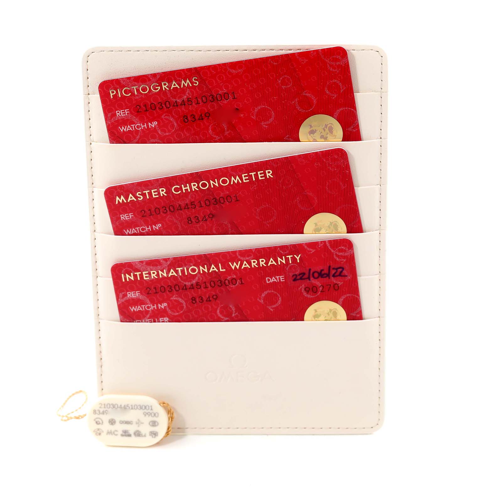 The image shows Omega Seamaster 210.30.44.51.06.001 Men's Stainless Steel Blue Dial 210.30.44.51.06.001 Men's Stainless Steel Blue Dial accessories, including warranty cards and a white cardholder.