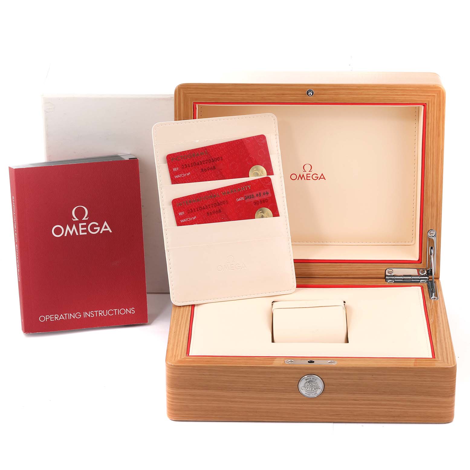 The image shows the Omega Aqua Terra 231.10.43.22.03.001 Men
s Stainless Steel Blue Dial 231.10.43.22.03.001 Men
s Stainless Steel Blue Dial watch box, operating instructions, and warranty cards from a frontal angle.