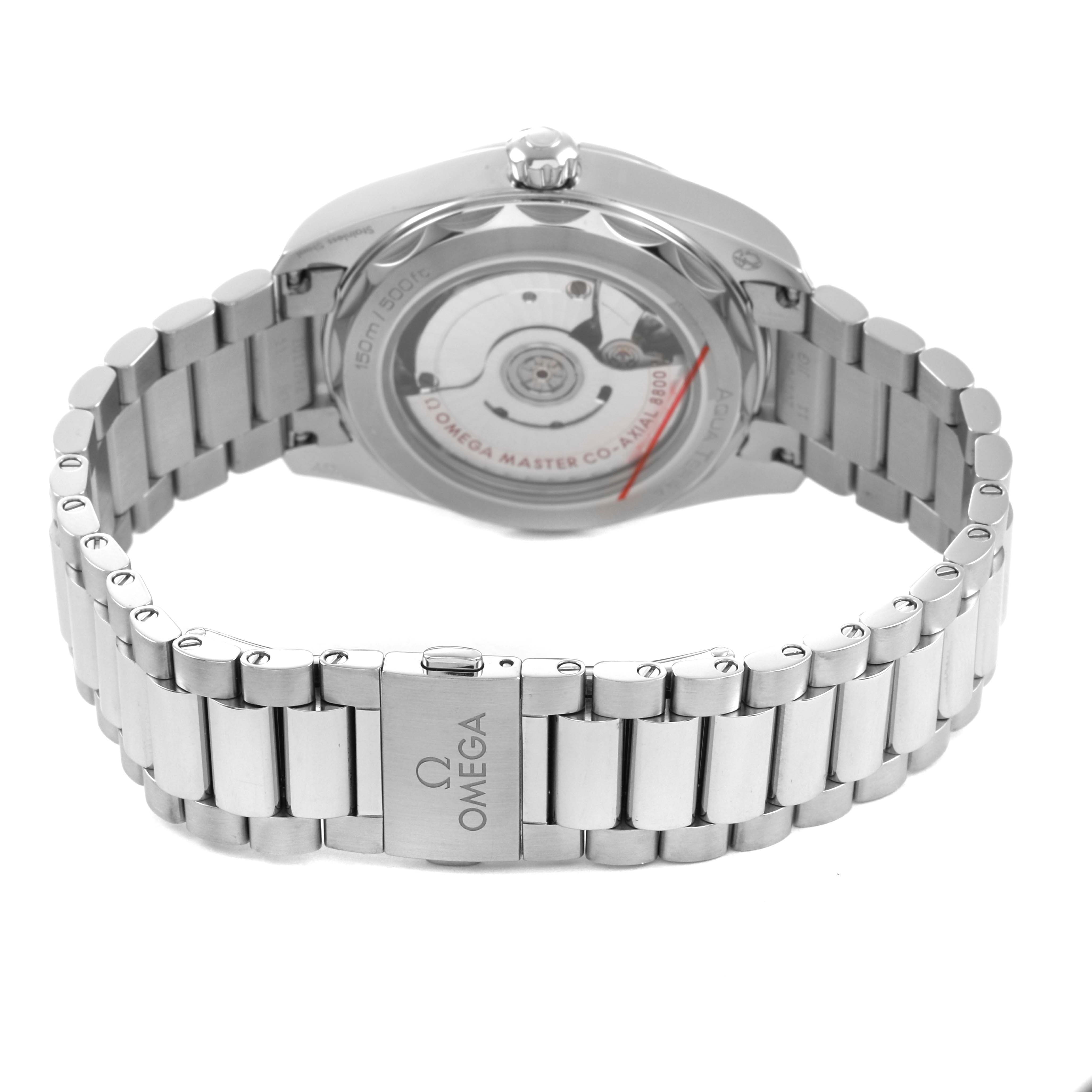 The image shows the back view of the Omega Seamaster 220.10.38.20.10.002 Men's Stainless Steel Green Dial watch, highlighting the stainless steel bracelet and open case back.