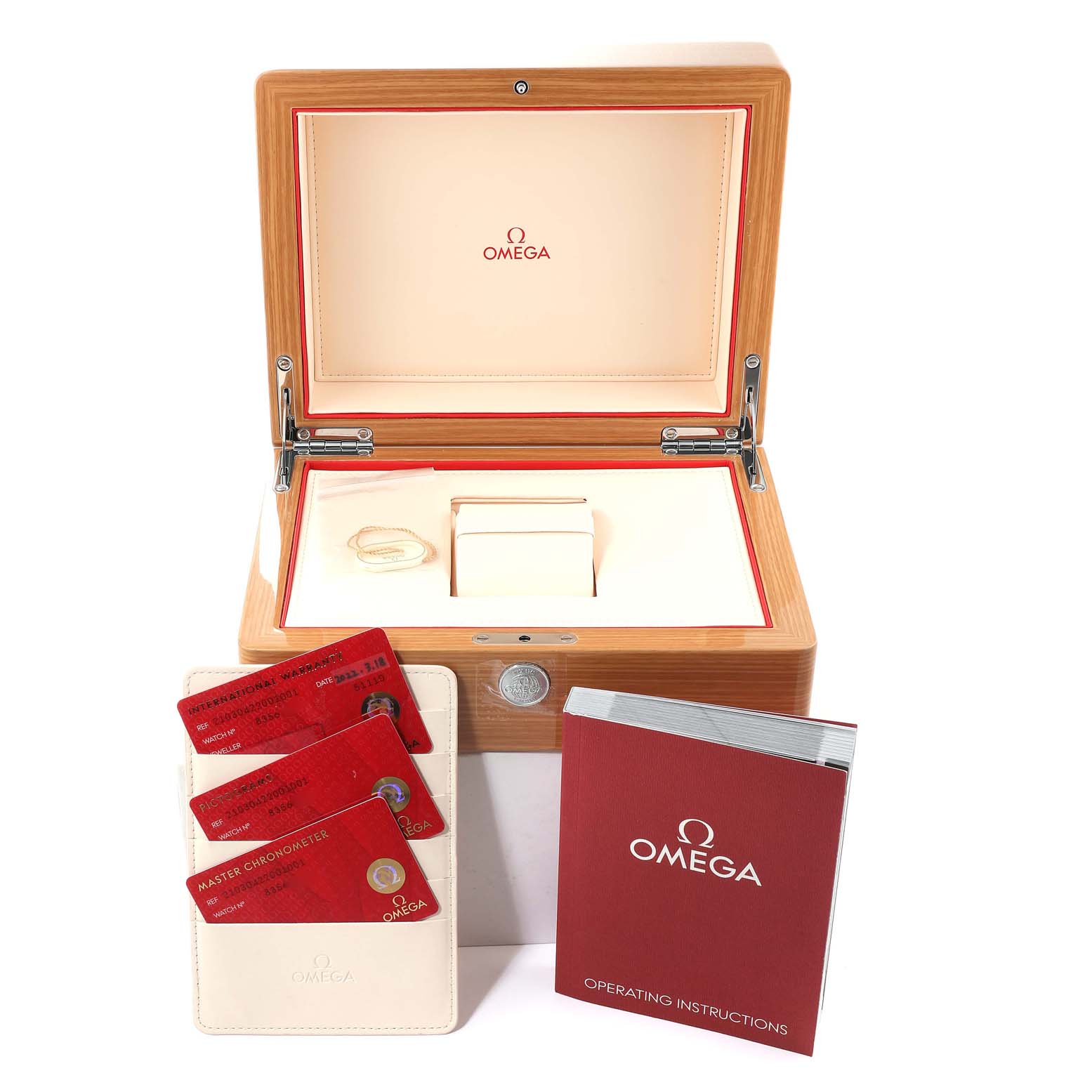 The image shows an open Omega Seamaster 210.30.42.20.01.001 Men's Stainless Steel Black Dial 210.30.42.20.01.001 Men's Stainless Steel Black Dial watch box, warranty cards, and the operating instructions manual.