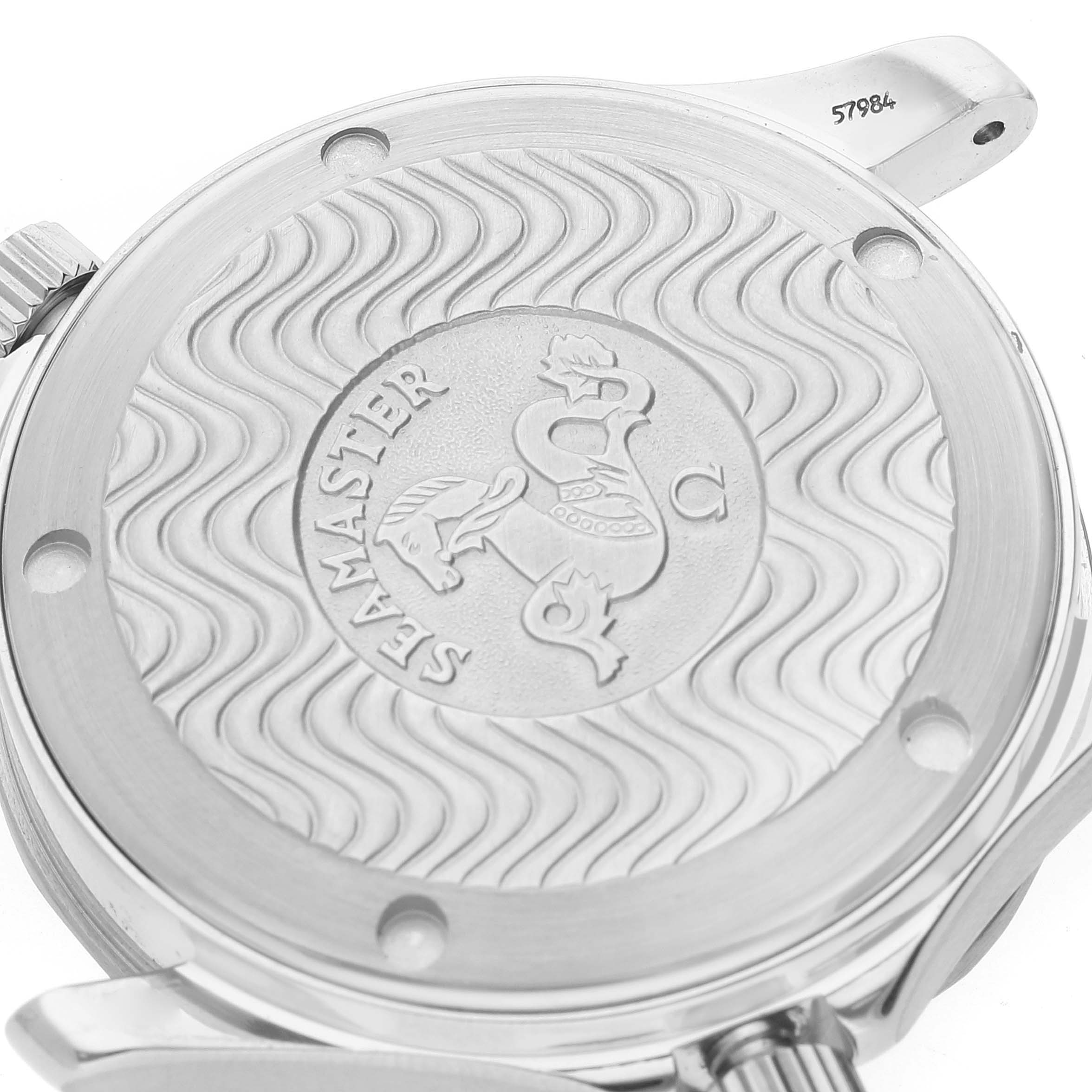 This image shows the back cover of an Omega Seamaster 2561.80.00 Men's Stainless Steel Blue Dial 2561.80.00 Men's Stainless Steel Blue Dial watch, highlighting its wavy pattern and engraved logo.