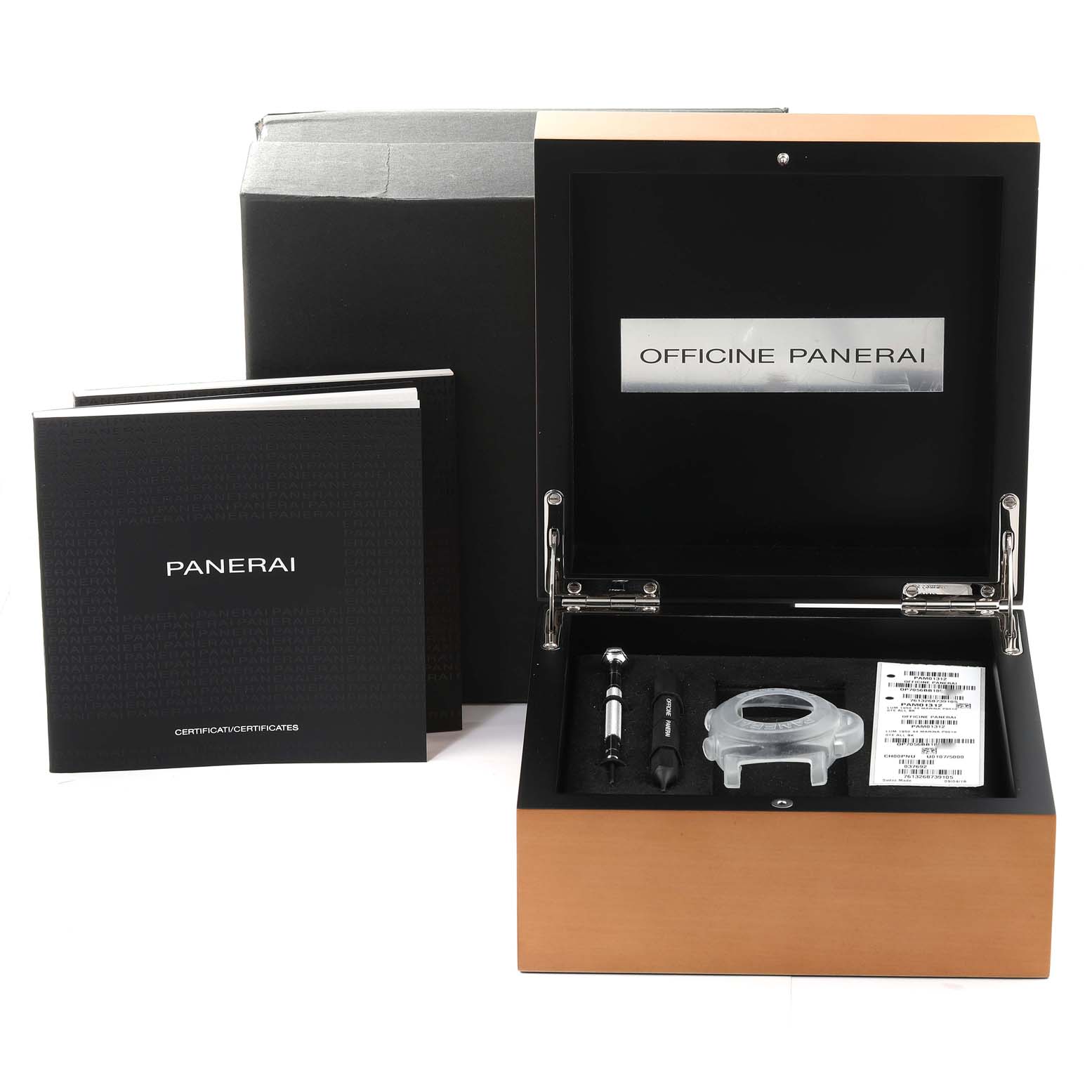 This image shows the open box of a Panerai Luminor PAM01392 Men
s Stainless Steel Black Dial PAM01392 Men
s Stainless Steel Black Dial watch, including tools, a protective case, and documentation.