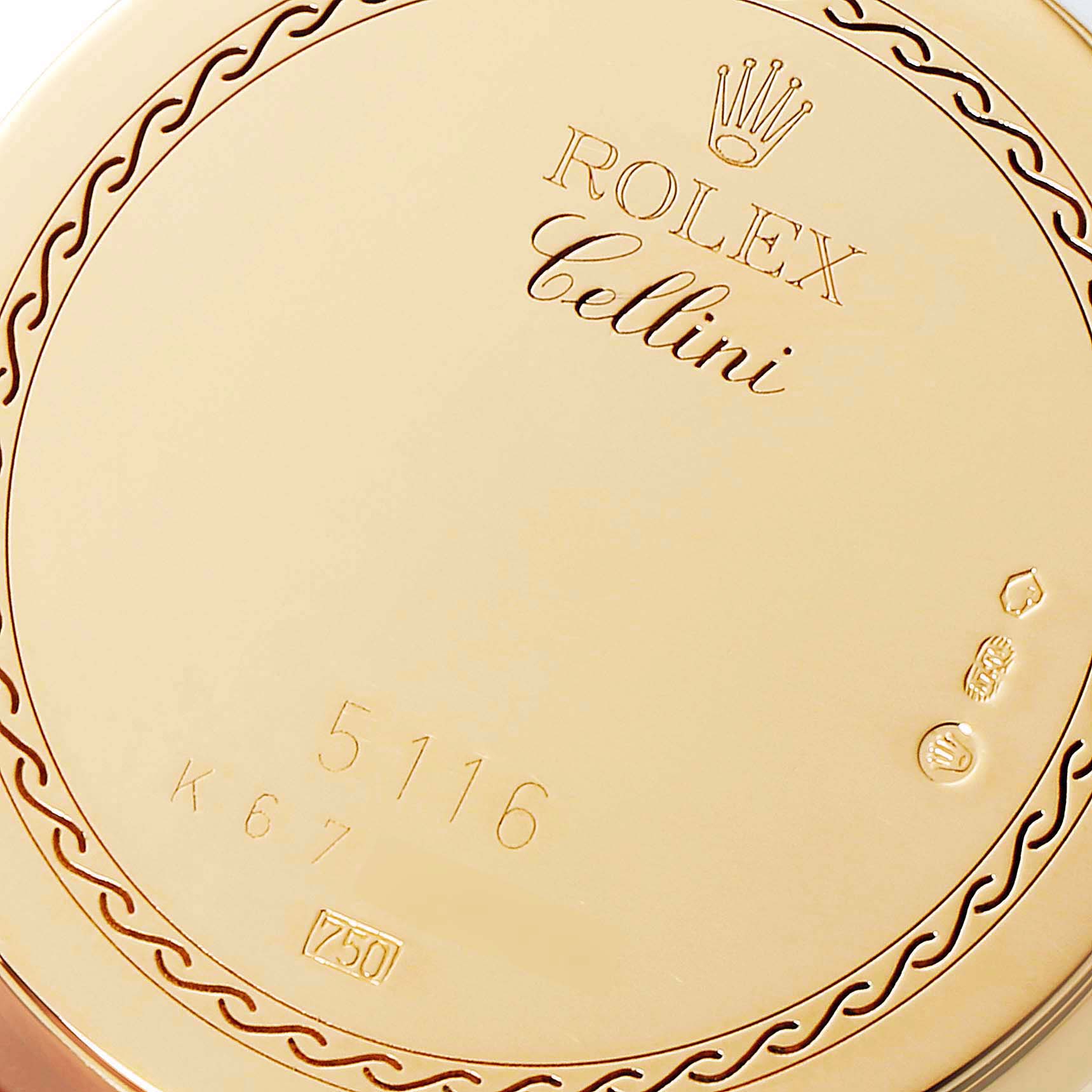This image shows the case back of a Rolex Cellini 5116 Men's Yellow Gold Champagne Dial 5116 Men's Yellow Gold Champagne Dial watch, featuring branding and model engravings.