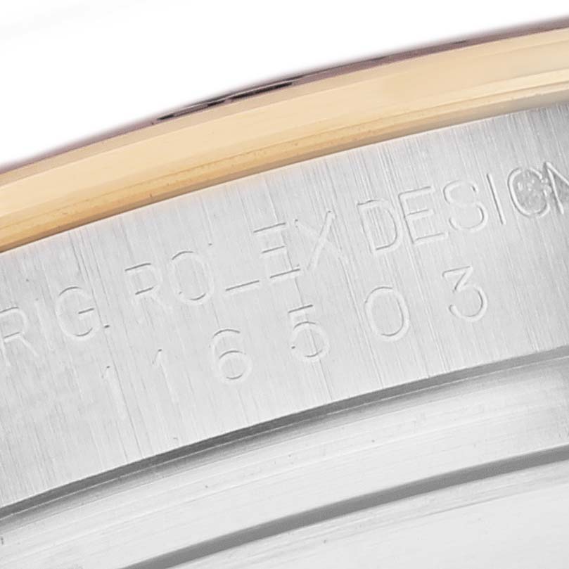 This image shows a close-up of the engraved reference number on the outer rim of a Rolex Daytona 116503 Men's Steel and Gold (two tone) Black Dial 116503 Men's Steel and Gold (two tone) Black Dial watch case.
