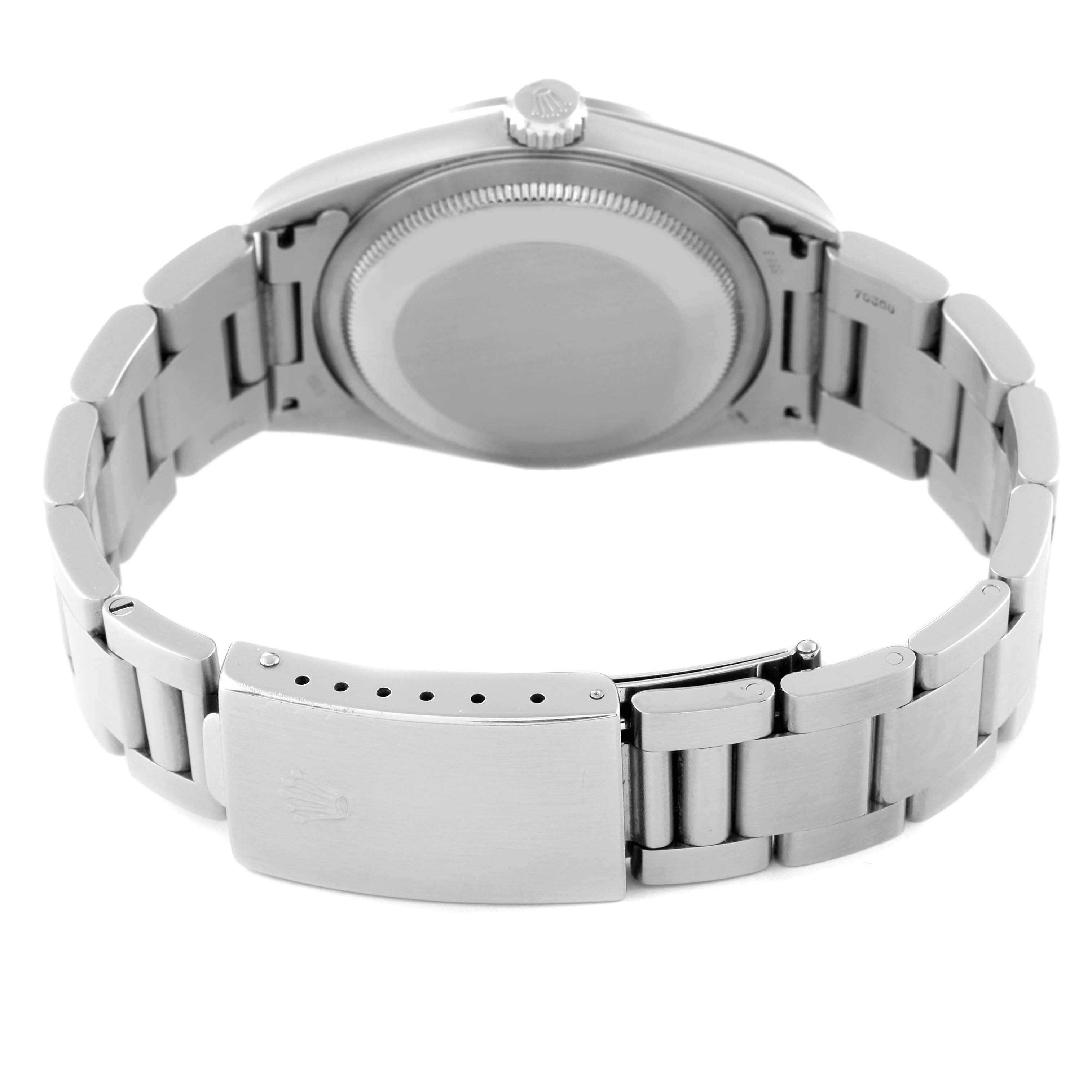 The image shows the back view of the Rolex Datejust 16200 Men's Stainless Steel Silver Dial 16200 Men's Stainless Steel Silver Dial watch, highlighting the case back and clasp of the bracelet.