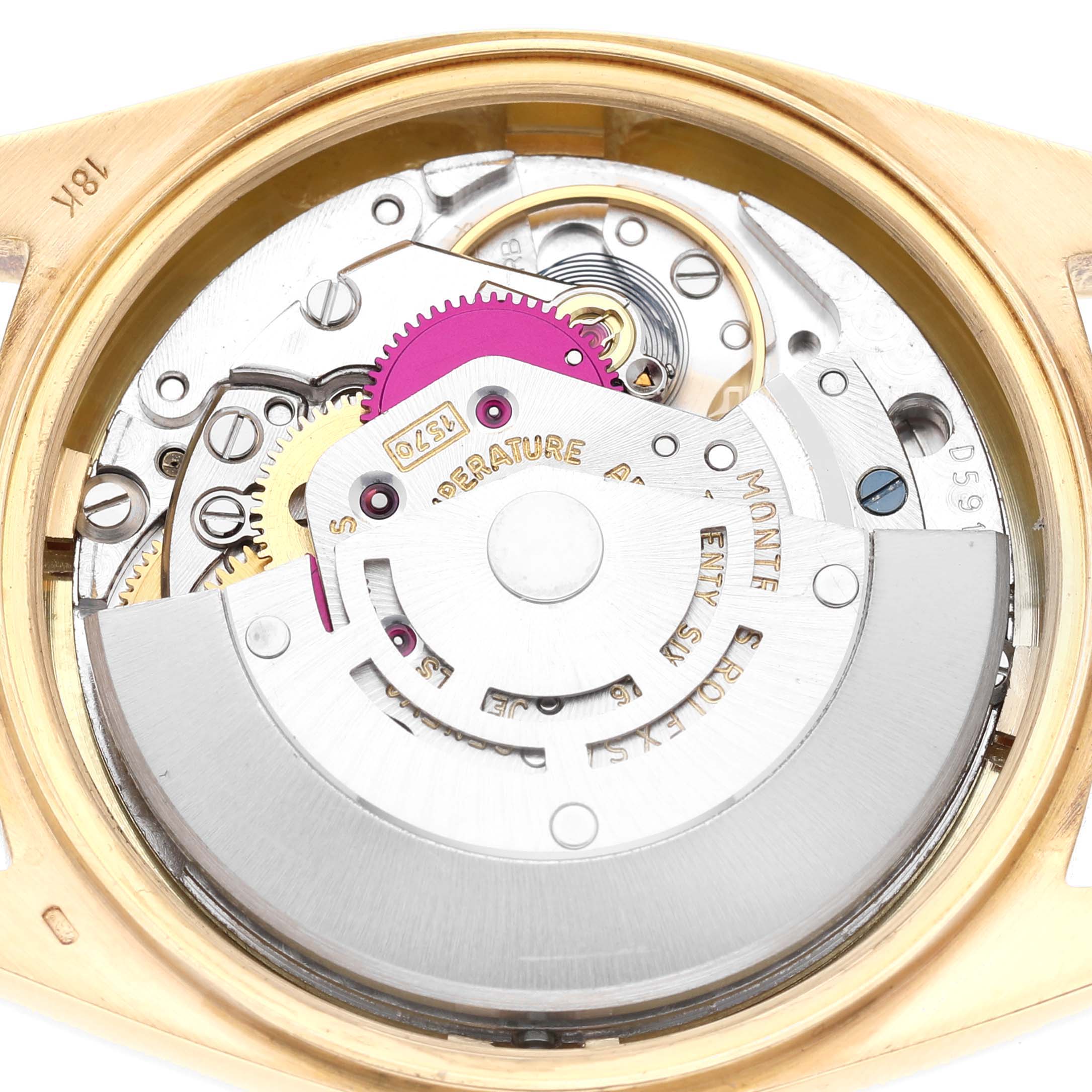 The image shows the internal mechanical movement of a Vintage Collection Rolex watch from the back.