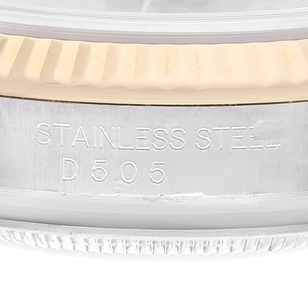 The image shows a close-up of the stainless steel case side engraving on a Rolex Datejust 116233 Men's Steel and Gold (two tone) Grey Dial 116233 Men's Steel and Gold (two tone) Grey Dial watch.