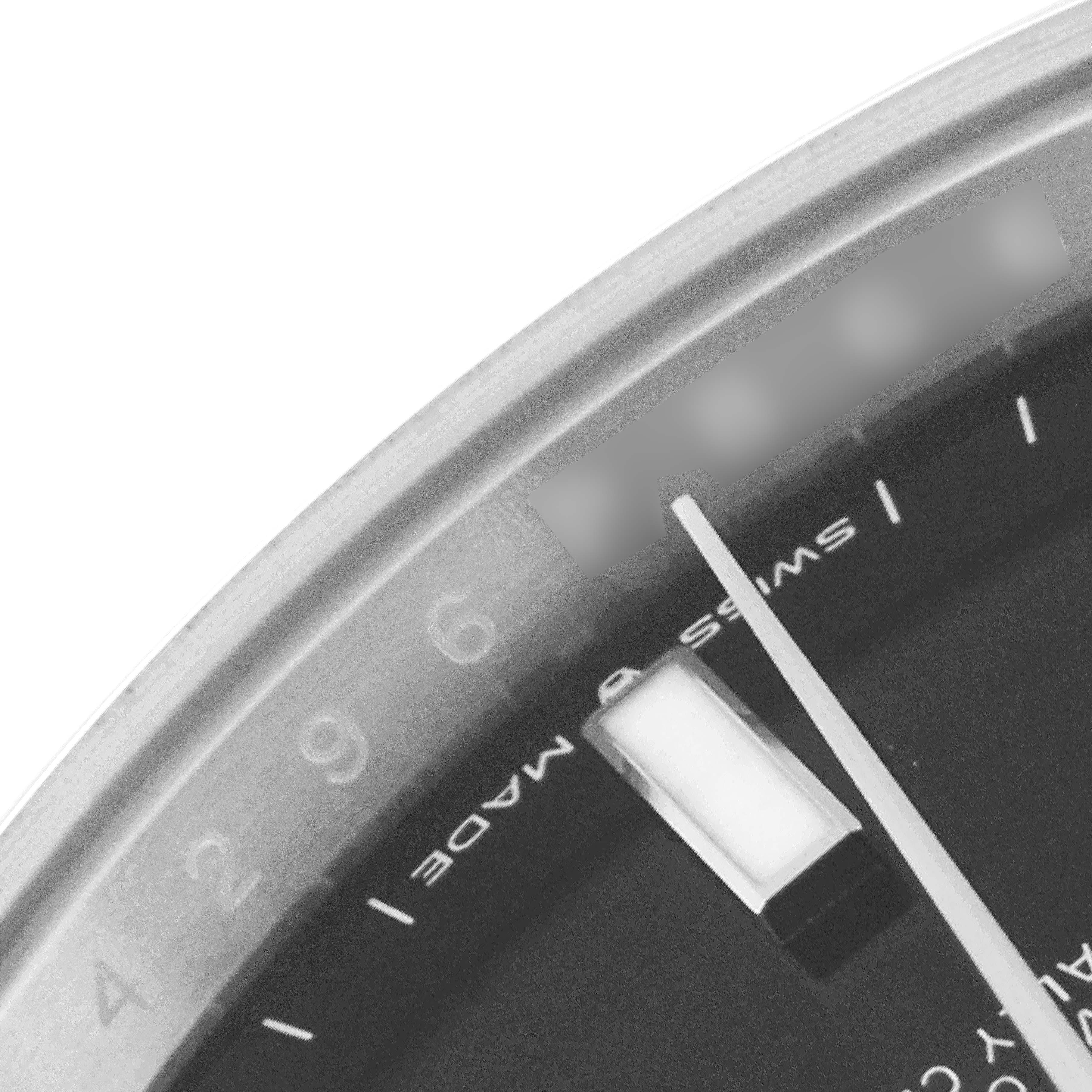 The image shows a close-up of the dial and bezel of a Rolex Datejust 41 126300 Men's Stainless Steel Black Dial 126300 Men's Stainless Steel Black Dial watch.