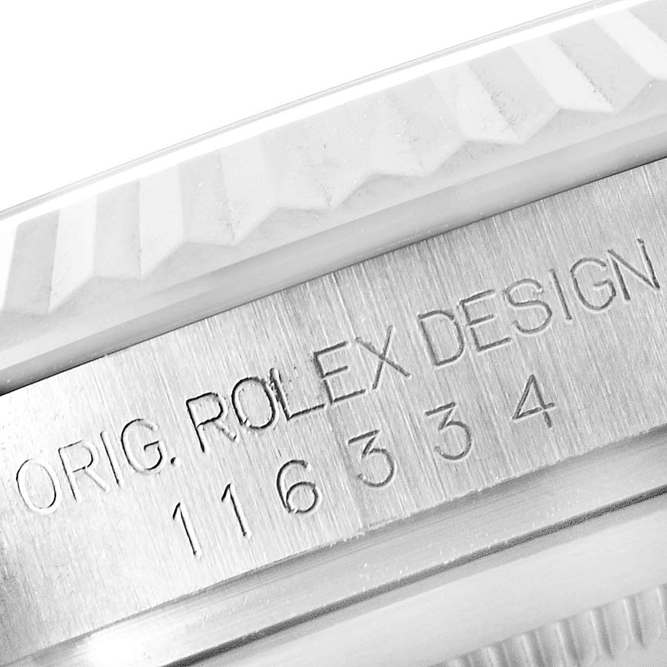 The image shows a close-up of the engraved model number and fluted bezel of a Rolex Datejust 41 116334 Men's Stainless Steel Grey Dial 116334 Men's Stainless Steel Grey Dial watch.