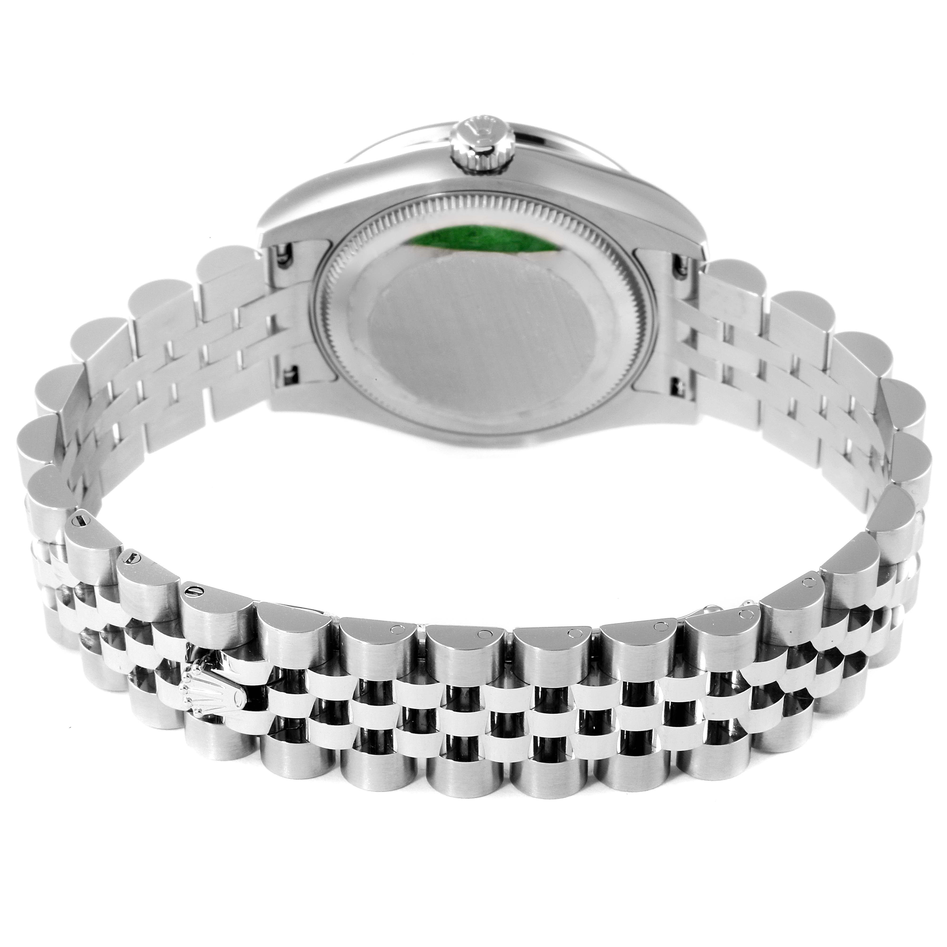 The image shows the backside and bracelet of a Mid-Size Rolex watch.