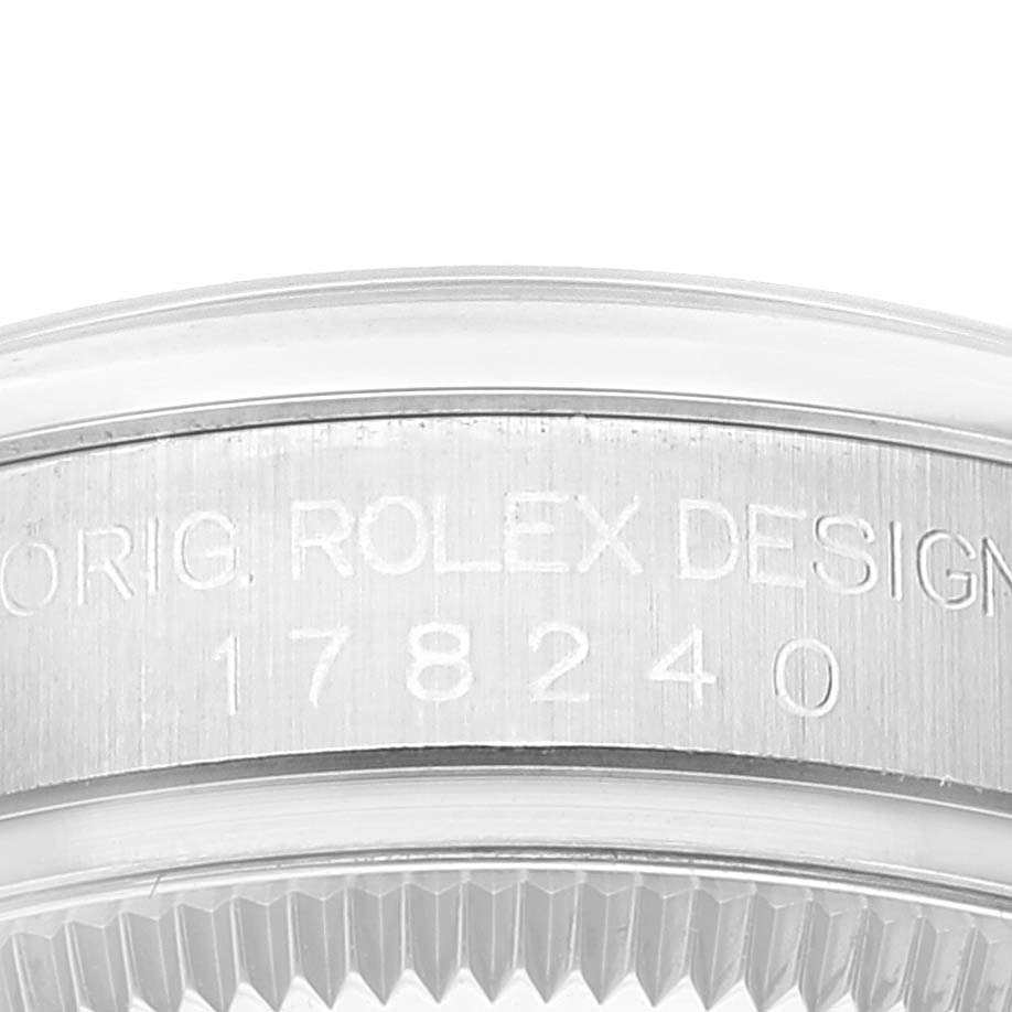 This image shows a close-up of the side bezel and model number (178240) engraved on a Mid-Size Rolex watch.