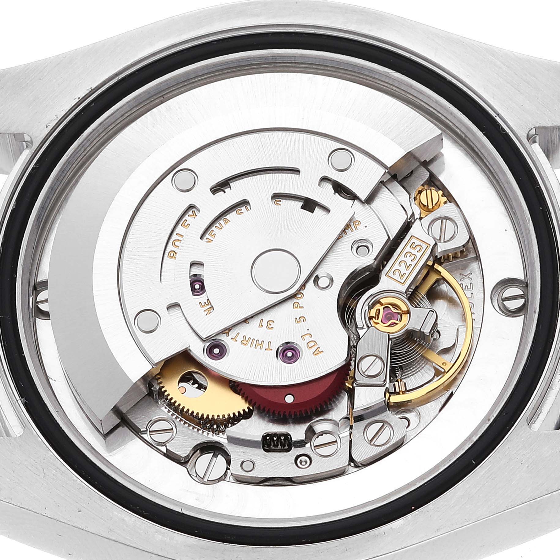 This is a close-up view of the internal mechanical movement of a Mid-Size Rolex watch.