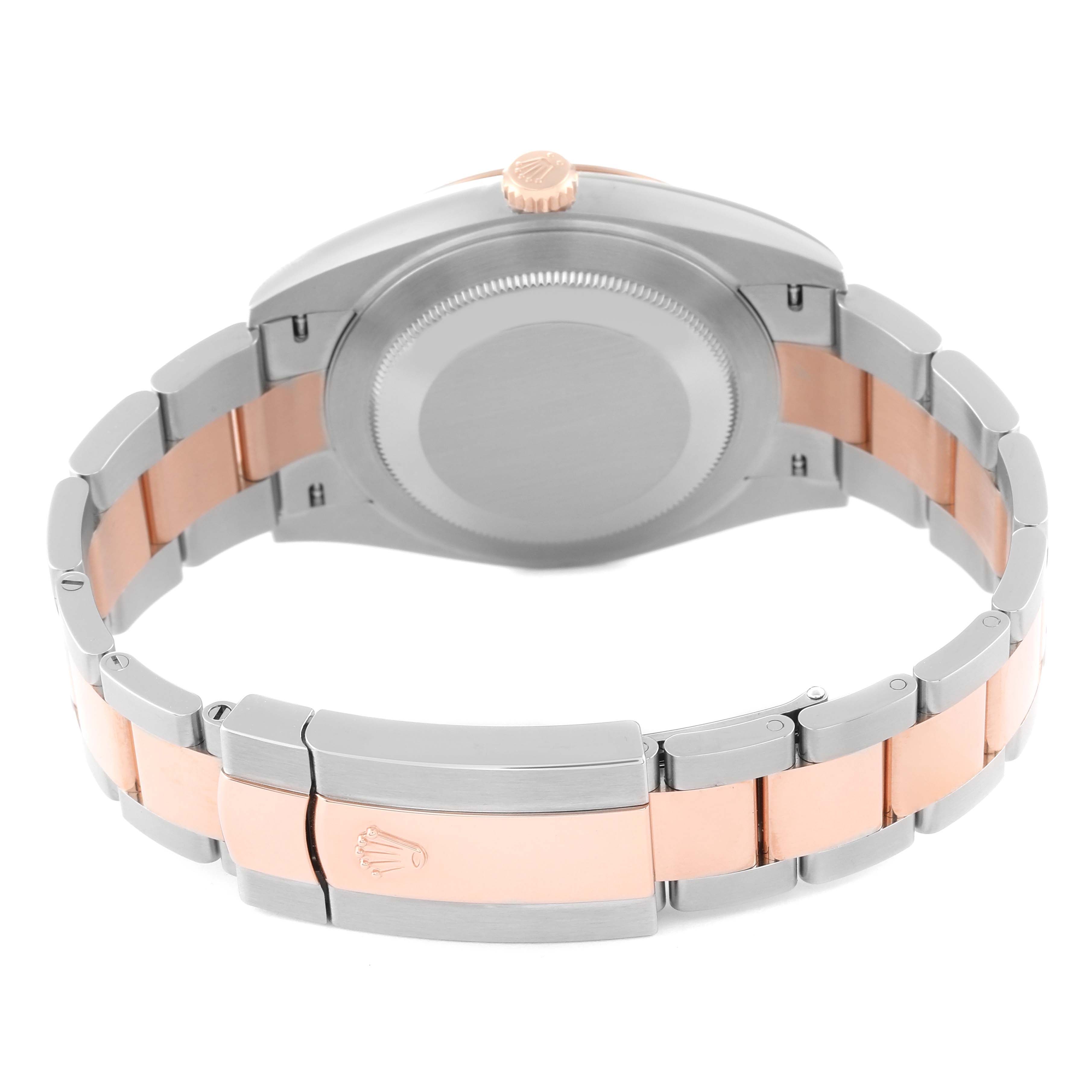 This image shows the Rolex Datejust 41 126301 Men's Steel and Gold (two tone) Mother of Pearl Dial 126301 Men's Steel and Gold (two tone) Mother of Pearl Dial from the back, highlighting the case back, crown, and two-tone bracelet with the clasp visible.