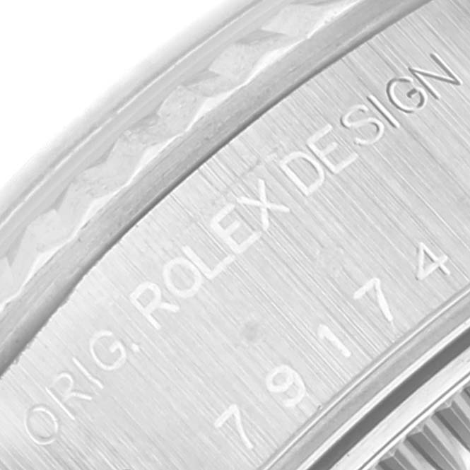 This image shows a close-up of the caseback engraving on a Rolex Datejust 79174 Women's Stainless Steel Blue Dial 79174 Women's Stainless Steel Blue Dial watch.