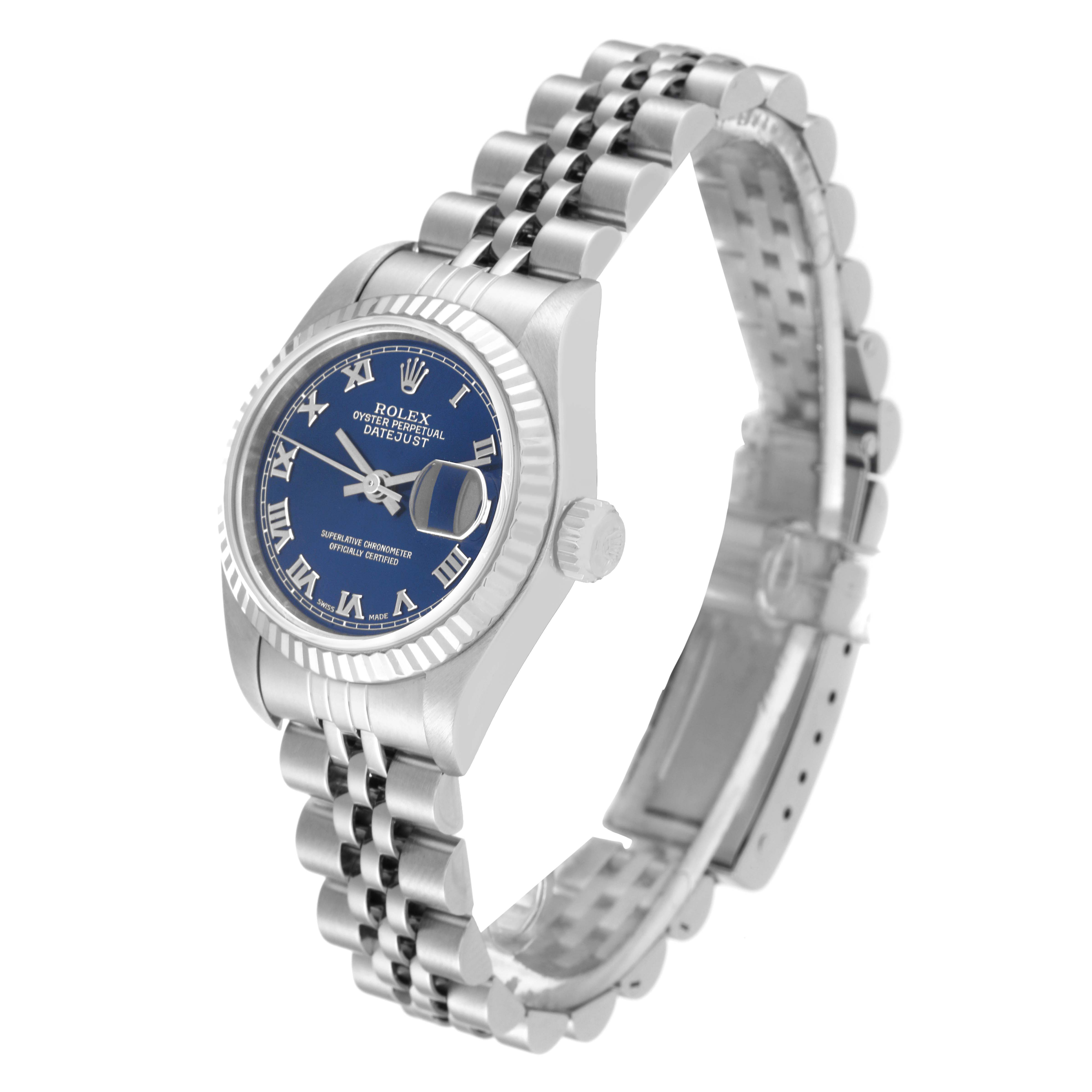 The image shows a Rolex Datejust 79174 Women's Stainless Steel Blue Dial 79174 Women's Stainless Steel Blue Dial watch at an angle highlighting the face, bezel, crown, and bracelet.
