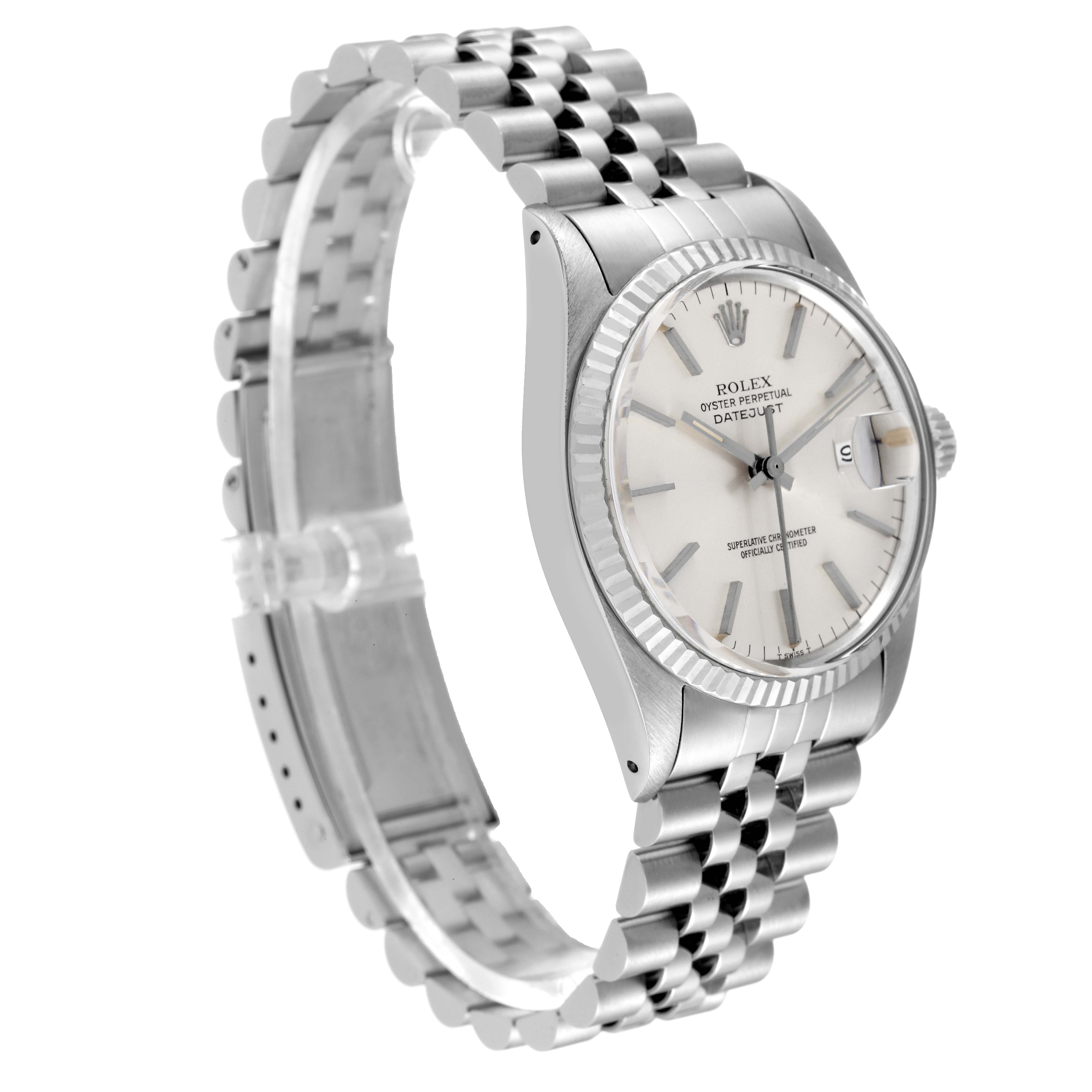 The image shows a side angle of a Rolex Vintage Collection 16014 Men
s Stainless Steel Silver Dial 16014 Men
s Stainless Steel Silver Dial watch, highlighting its bezel, dial, and bracelet.