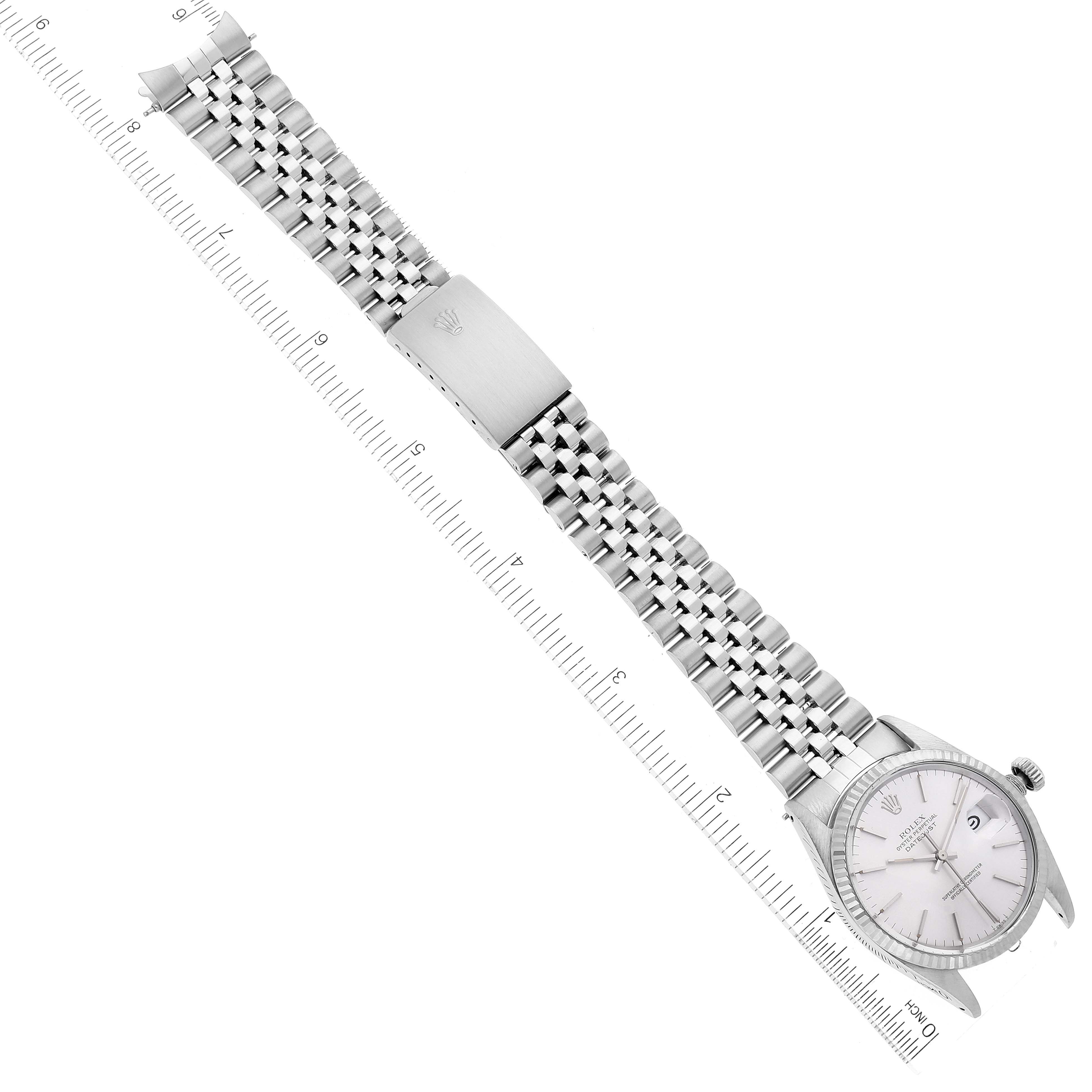 The image shows an overhead view of the Rolex Vintage Collection 16014 Men
s Stainless Steel Silver Dial 16014 Men
s Stainless Steel Silver Dial watch, displaying the entire watchband and face.