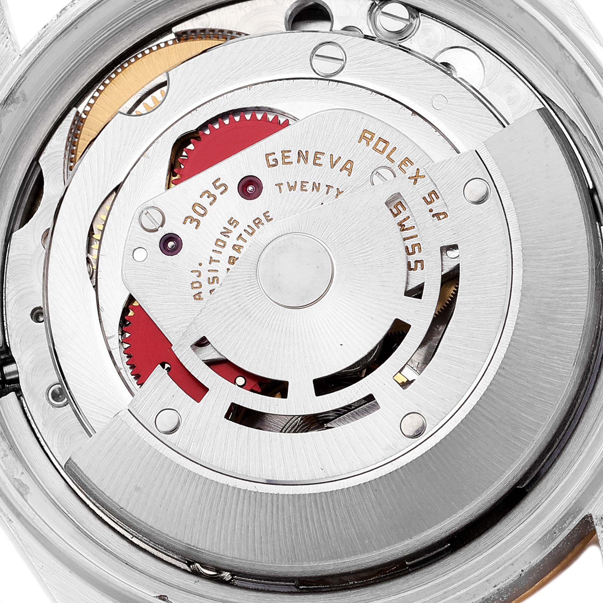 This image shows the intricate internal mechanism of the Rolex Datejust 16013 Men
s Steel and Gold (two tone) Silver Dial 16013 Men
s Steel and Gold (two tone) Silver Dial watch, focusing on the rotor and gears.