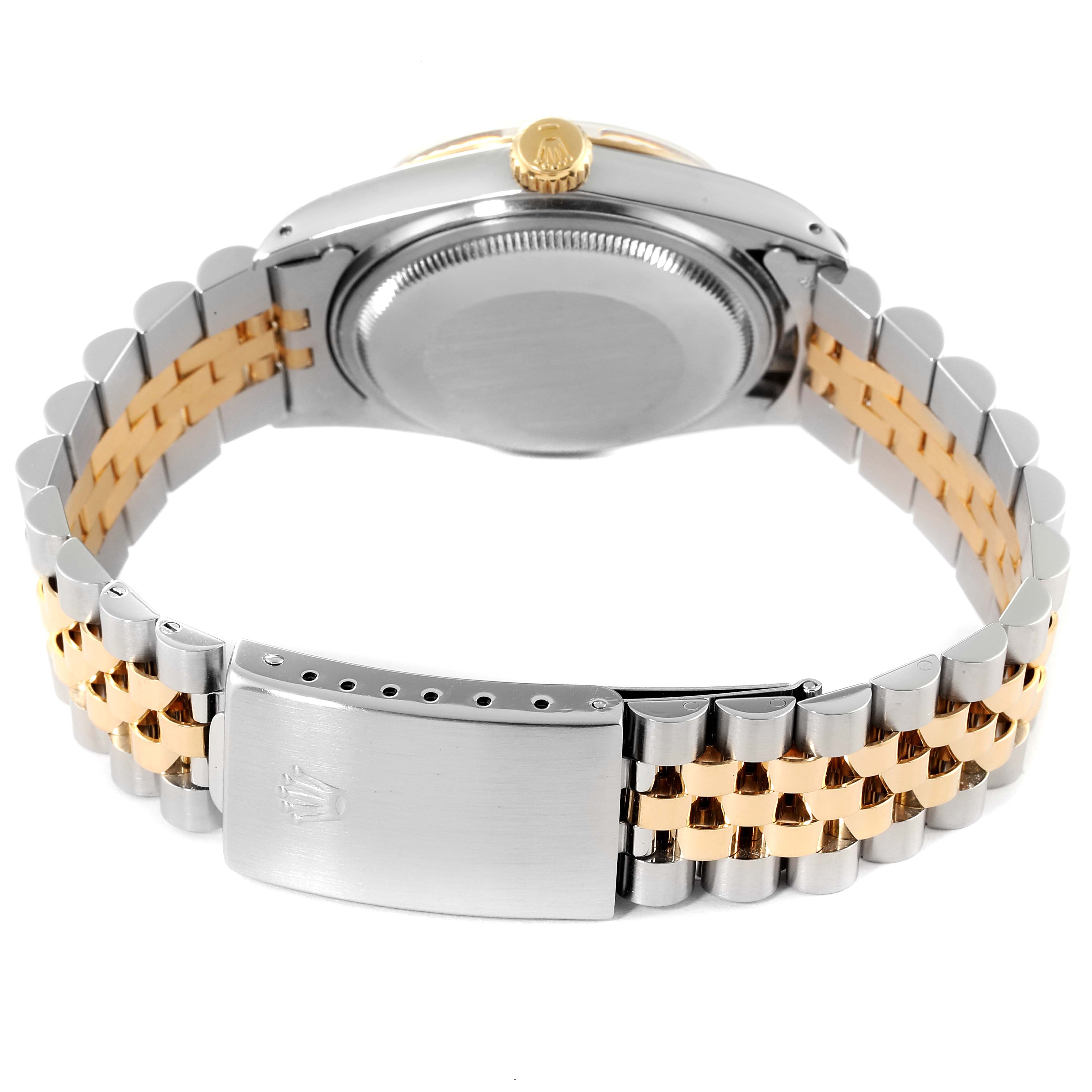 The image shows the back view of a Rolex Datejust 16013 Men
s Steel and Gold (two tone) Silver Dial 16013 Men
s Steel and Gold (two tone) Silver Dial watch, highlighting its bi-metal bracelet and closed clasp.