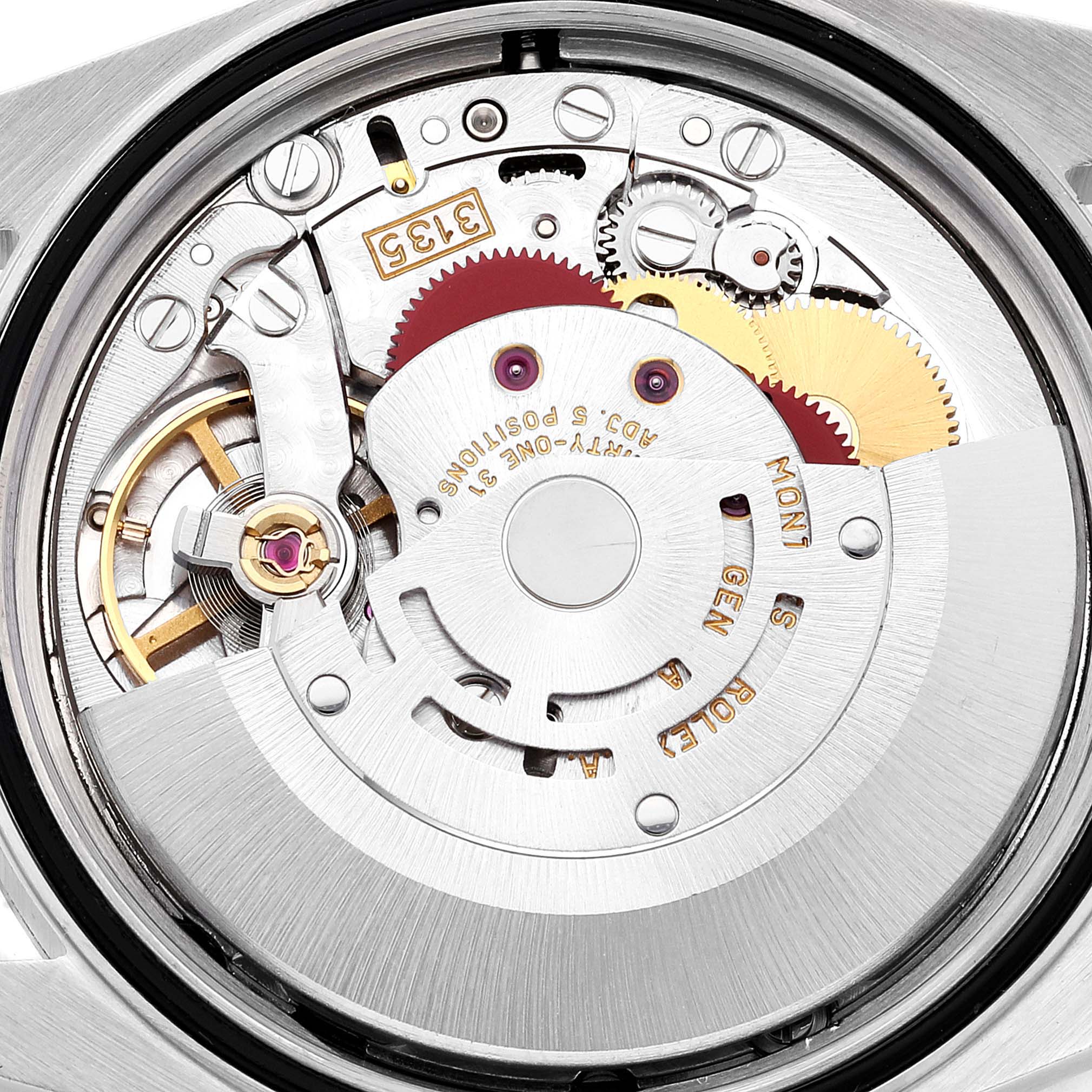 The image shows a close-up of the internal mechanism, specifically the movement, of a Rolex Datejust 16233 Men's Steel and Gold (two tone) White Dial 16233 Men's Steel and Gold (two tone) White Dial watch.