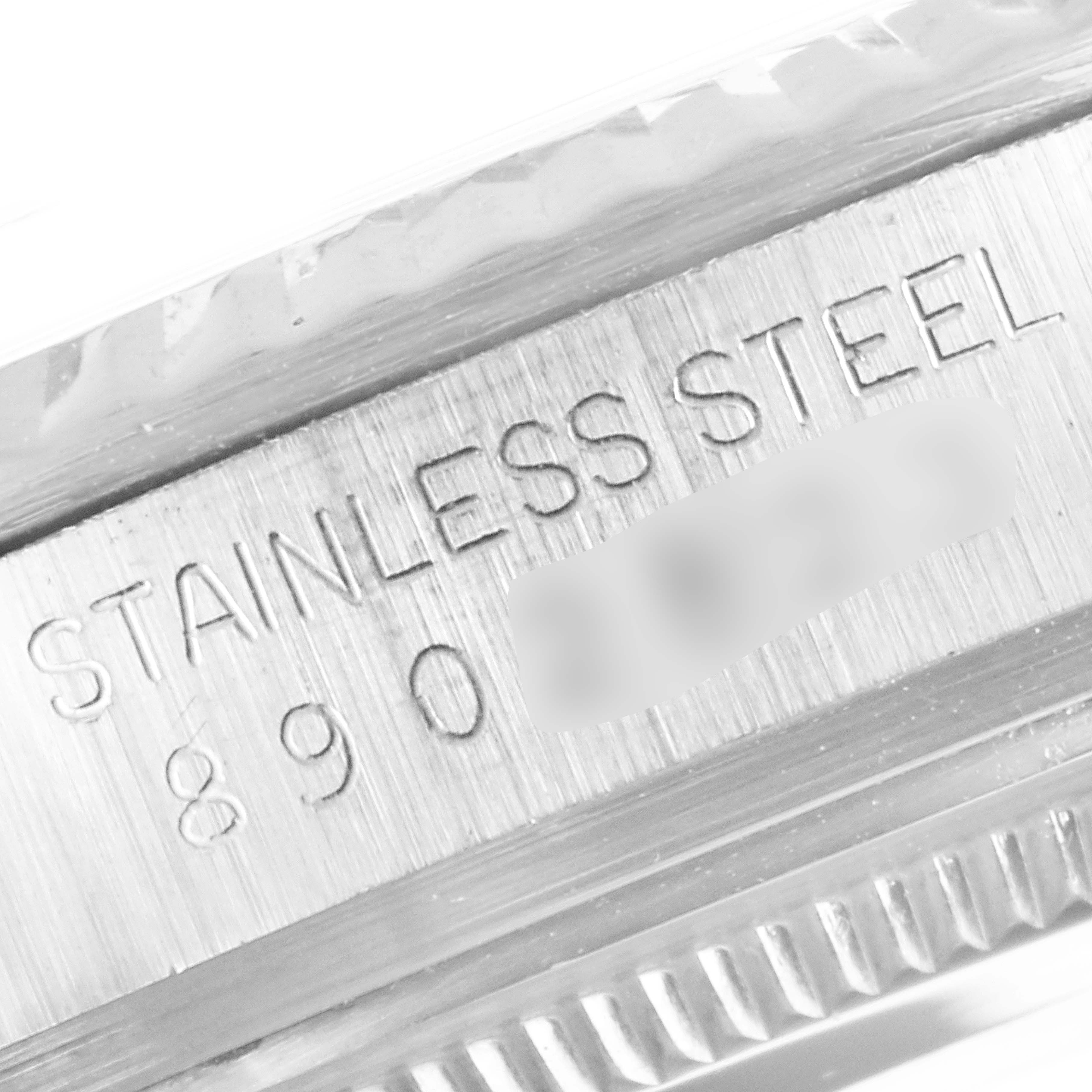 The image shows a close-up angle of the case side of a Rolex Vintage Collection 16014 Men's Stainless Steel Black Dial 16014 Men's Stainless Steel Black Dial model, highlighting the "STAINLESS STEEL" engraving.