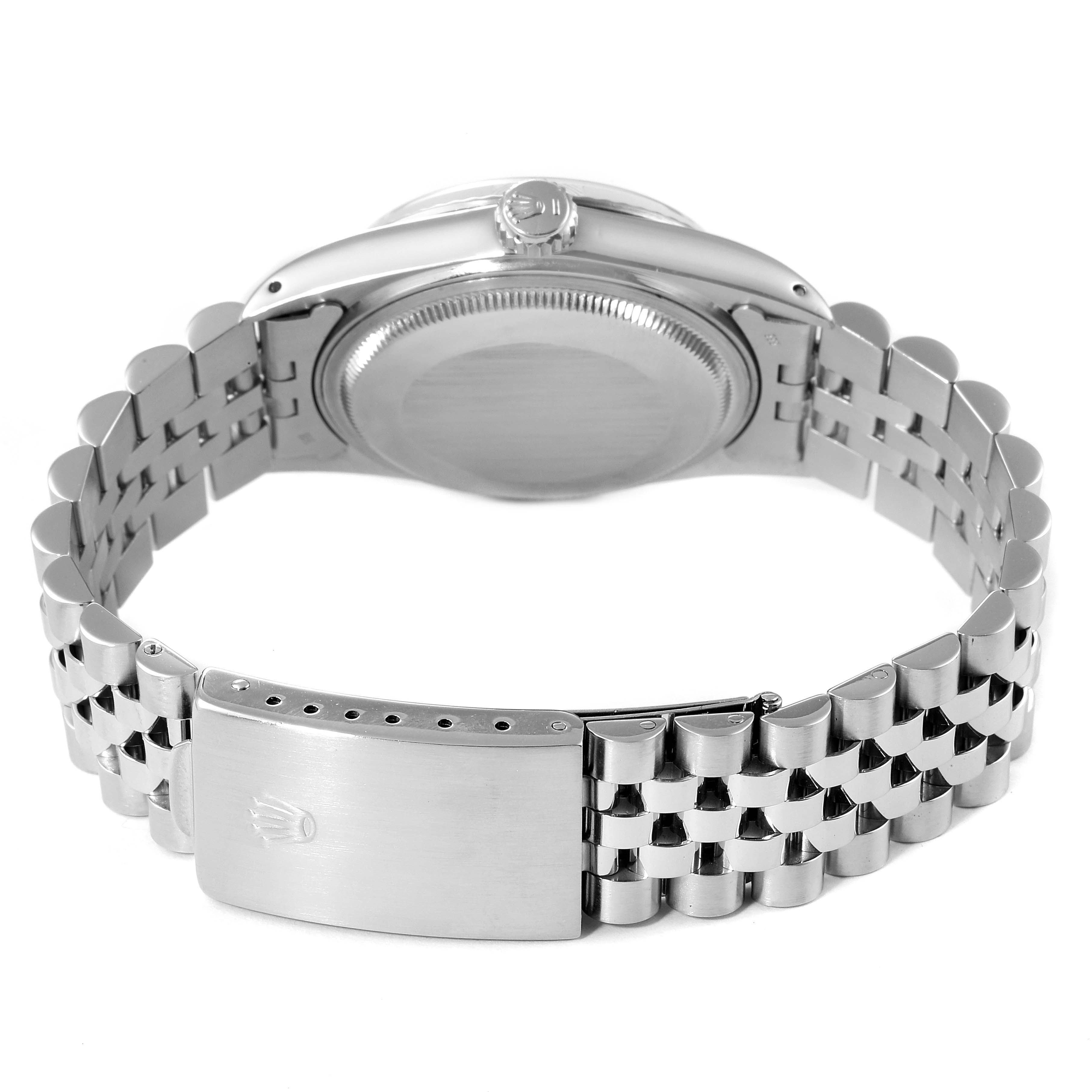 This image shows the back and bracelet of a Vintage Collection model Rolex watch from a rear angle.