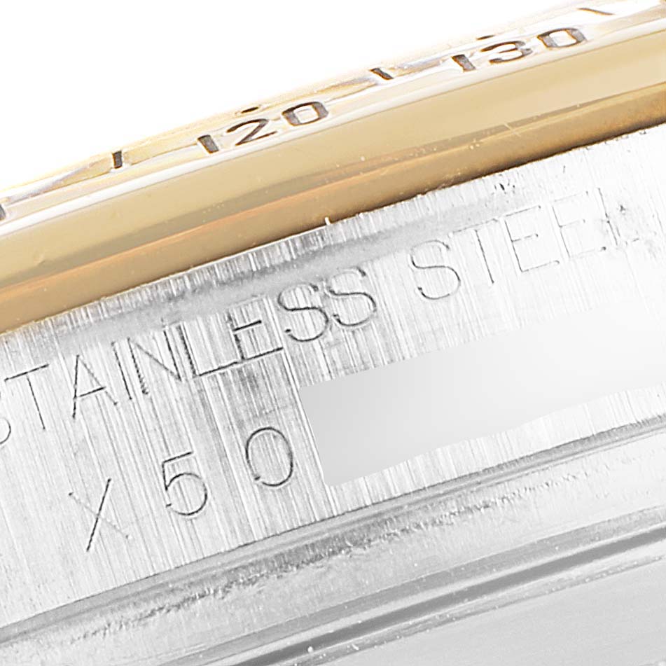 Close-up of the stainless steel case and part of the bezel of a Rolex Daytona 16523 Men
s Steel and Gold (two tone) Black Dial 16523 Men
s Steel and Gold (two tone) Black Dial watch.