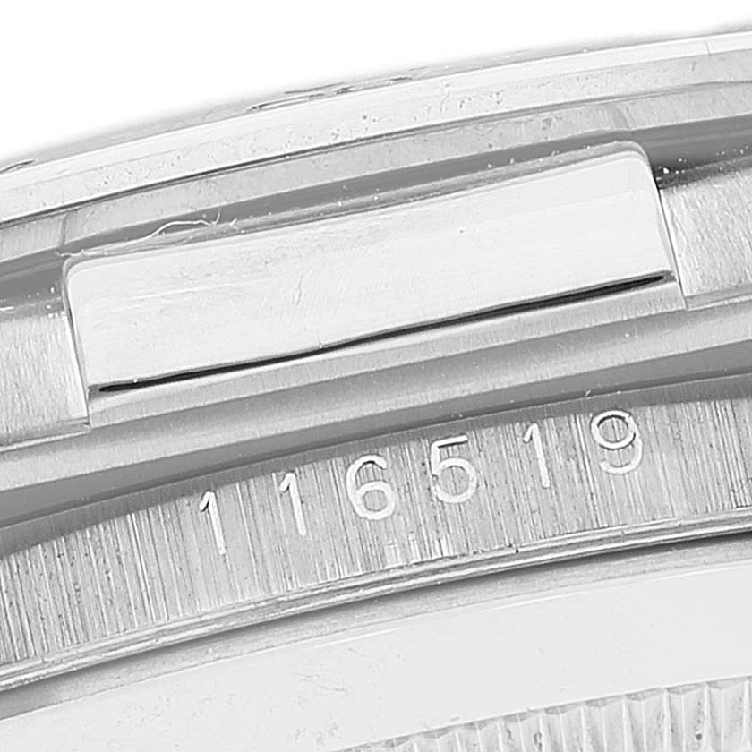 This close-up image of a Rolex Daytona 116519 Men's White Gold Silver Dial 116519 Men's White Gold Silver Dial watch shows the model number "116519" engraved on the side of the watch case.