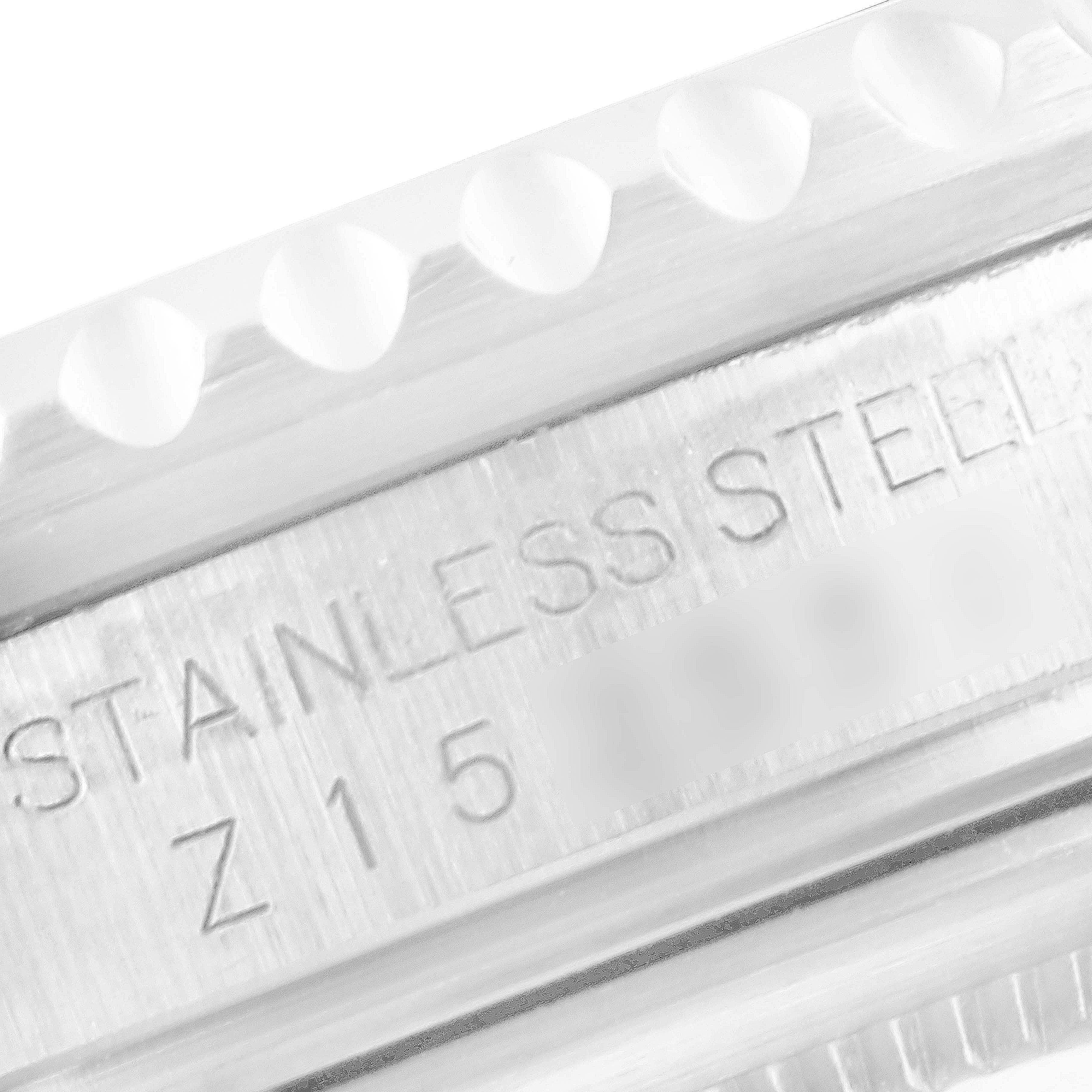 The image shows a close-up view of the bezel edge and the engraved stainless steel information on a Rolex GMT-Master 16710 Men
s Stainless Steel Black Dial 16710 Men
s Stainless Steel Black Dial watch.