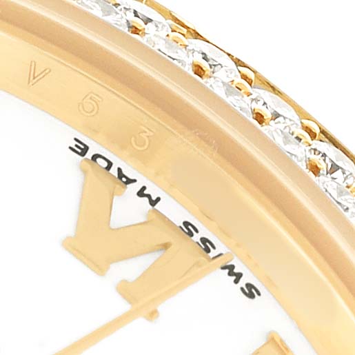 The image shows a close-up of the Rolex Pearlmaster 81338 Women's Yellow Gold White Dial's bezel and part of the dial.