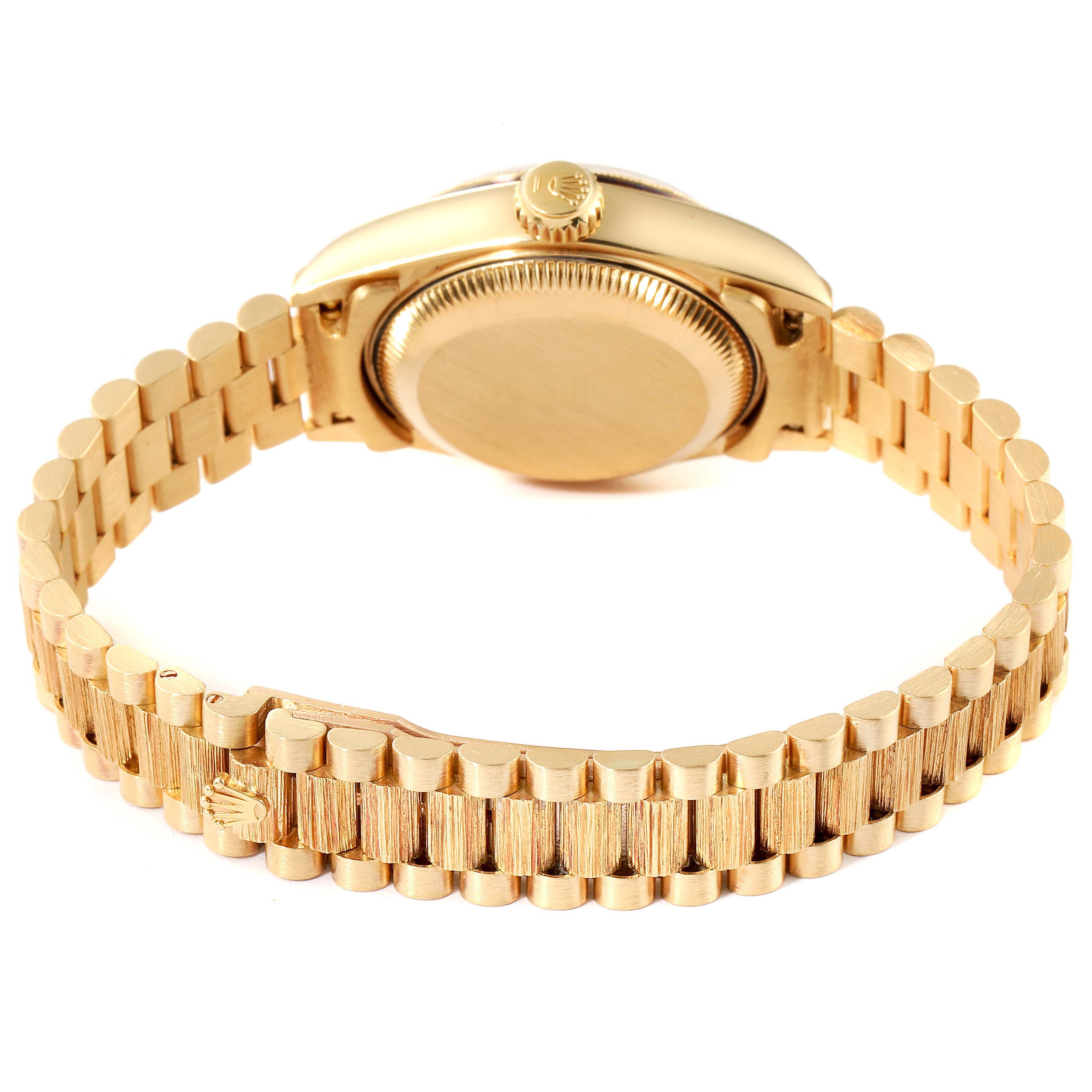 The image shows the back view and bracelet of a Rolex President 69278 Women's Yellow Gold Beige Dial 69278 Women's Yellow Gold Beige Dial model watch in gold.