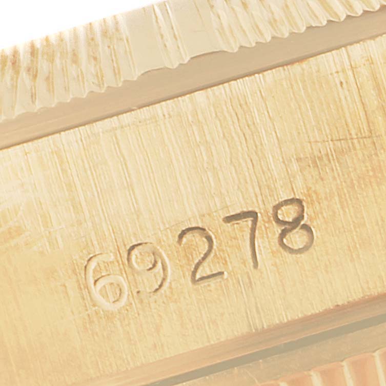 This image shows a close-up of the case, model number 69278, and the fluted bezel of the Rolex President 69278 Women's Yellow Gold Beige Dial 69278 Women's Yellow Gold Beige Dial watch.