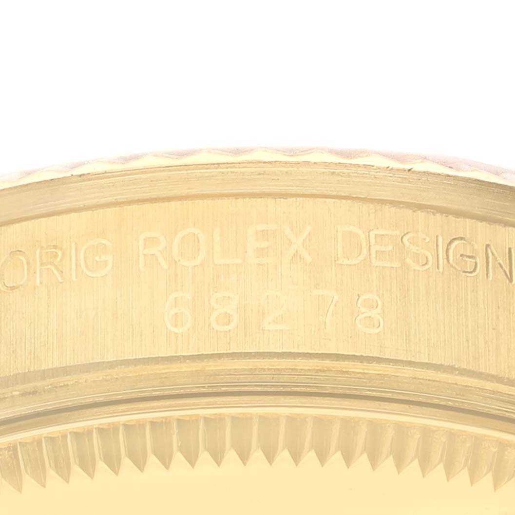This image shows a detailed close-up of the engraved case side of a Rolex President 68278 Women's Yellow Gold Champagne Dial 68278 Women's Yellow Gold Champagne Dial model watch, displaying the design number.