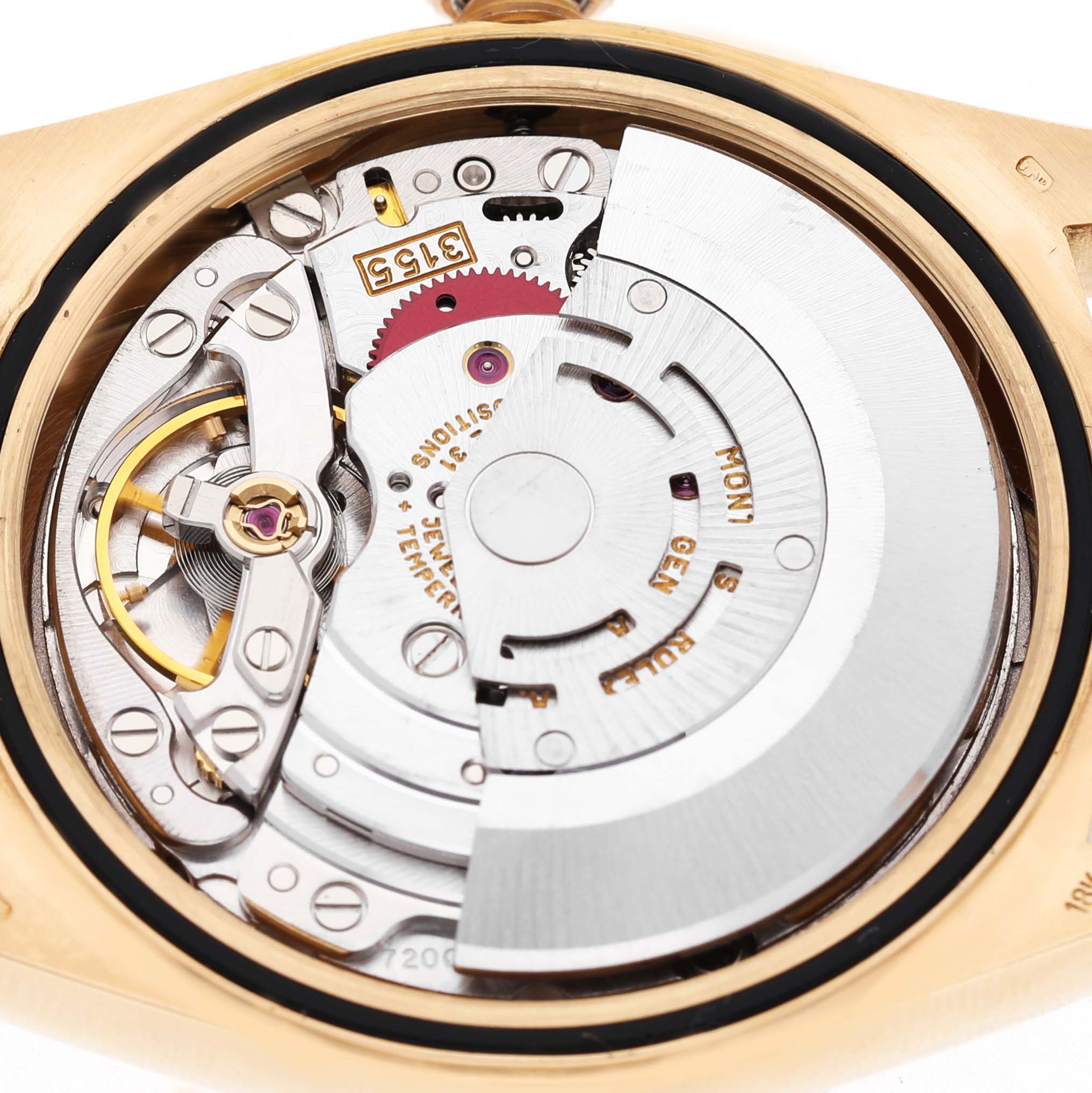 The image shows the internal mechanism of a Rolex President 18238 Men's Yellow Gold Champagne Dial watch, focusing on the rotor and movement components.