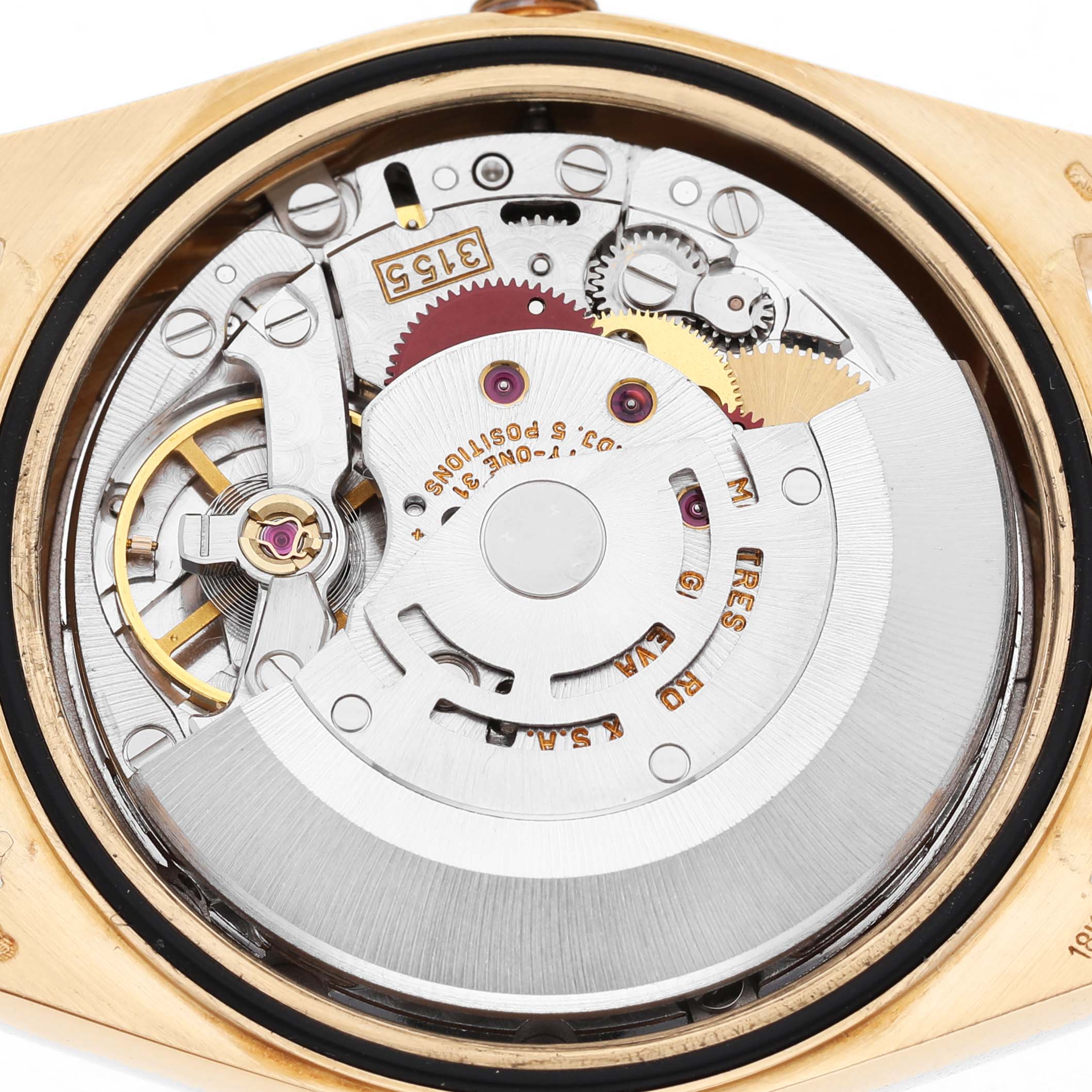 The image shows a close-up of the movement inside a Rolex President 18238 Men's Yellow Gold Champagne Dial watch.