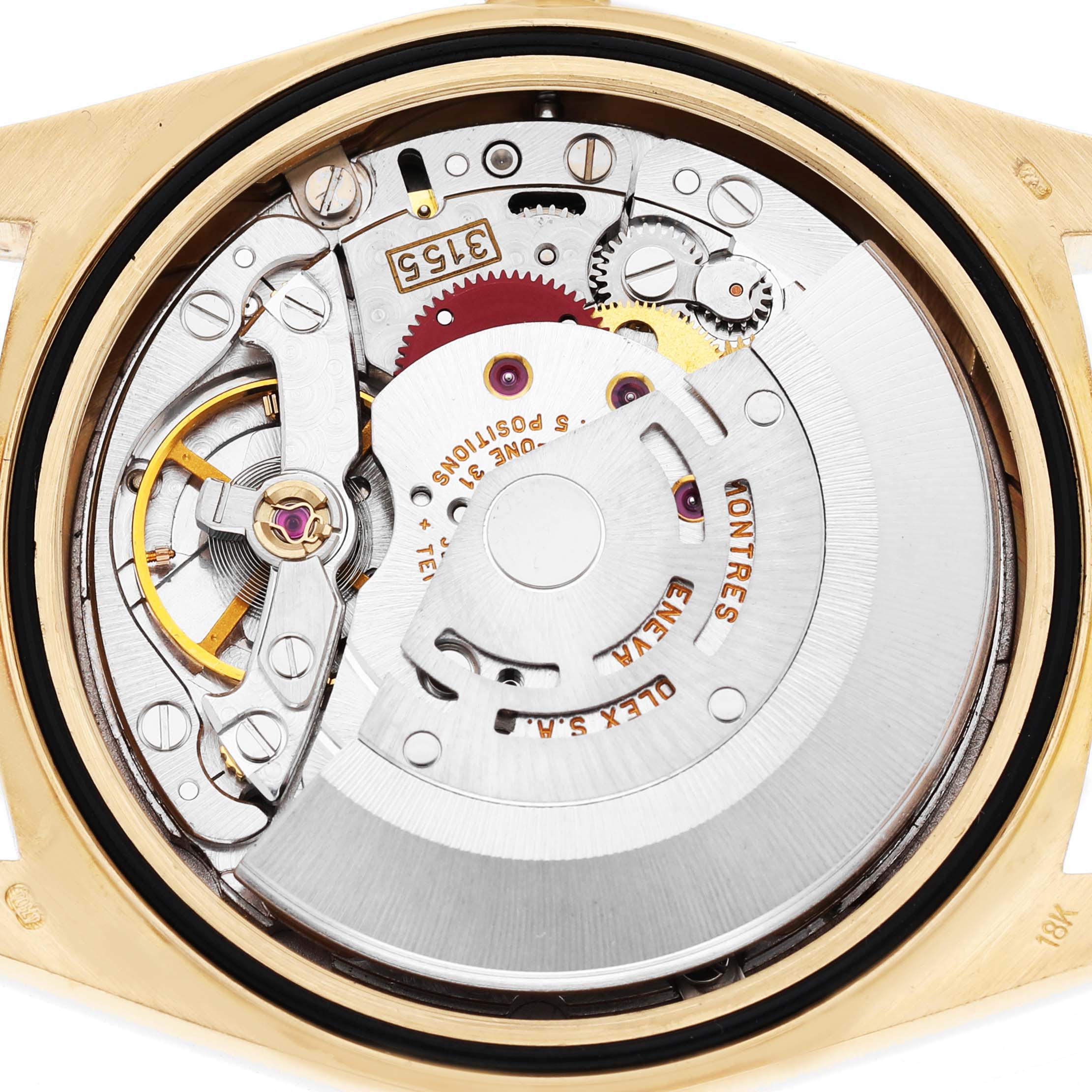 The image shows a close-up of the movement mechanism of a Rolex President 18238 Men's Yellow Gold White Dial model watch.
