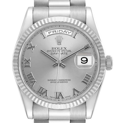 The Rolex President 118209 Men's White Gold Silver Dial model watch is shown from the front, displaying the dial, day, date window, and fluted bezel.