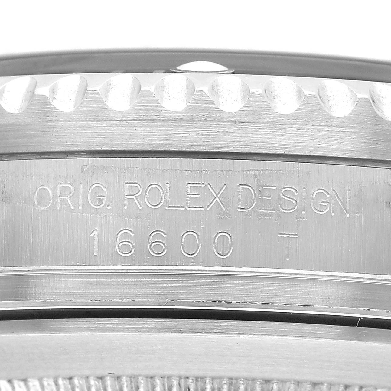 The image shows the side view of a Rolex Sea-Dweller 16600 Men's Stainless Steel Black Dial model 16600 with an engraved bezel.
