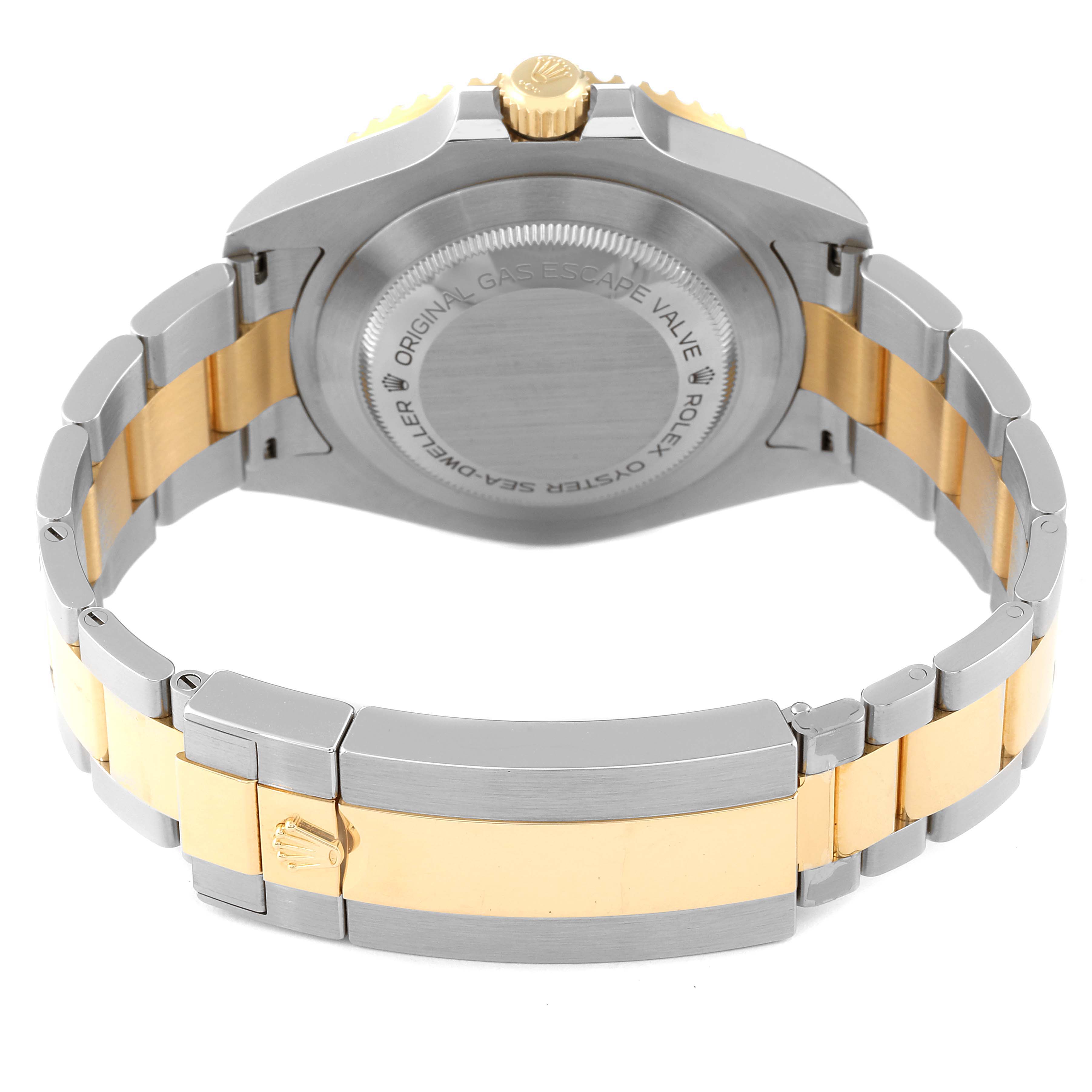 The image shows the back case and bracelet of a Rolex Sea-Dweller 126603 Men's Steel and Gold (two tone) Black Dial 126603 Men's Steel and Gold (two tone) Black Dial watch, highlighting its two-tone metal design.