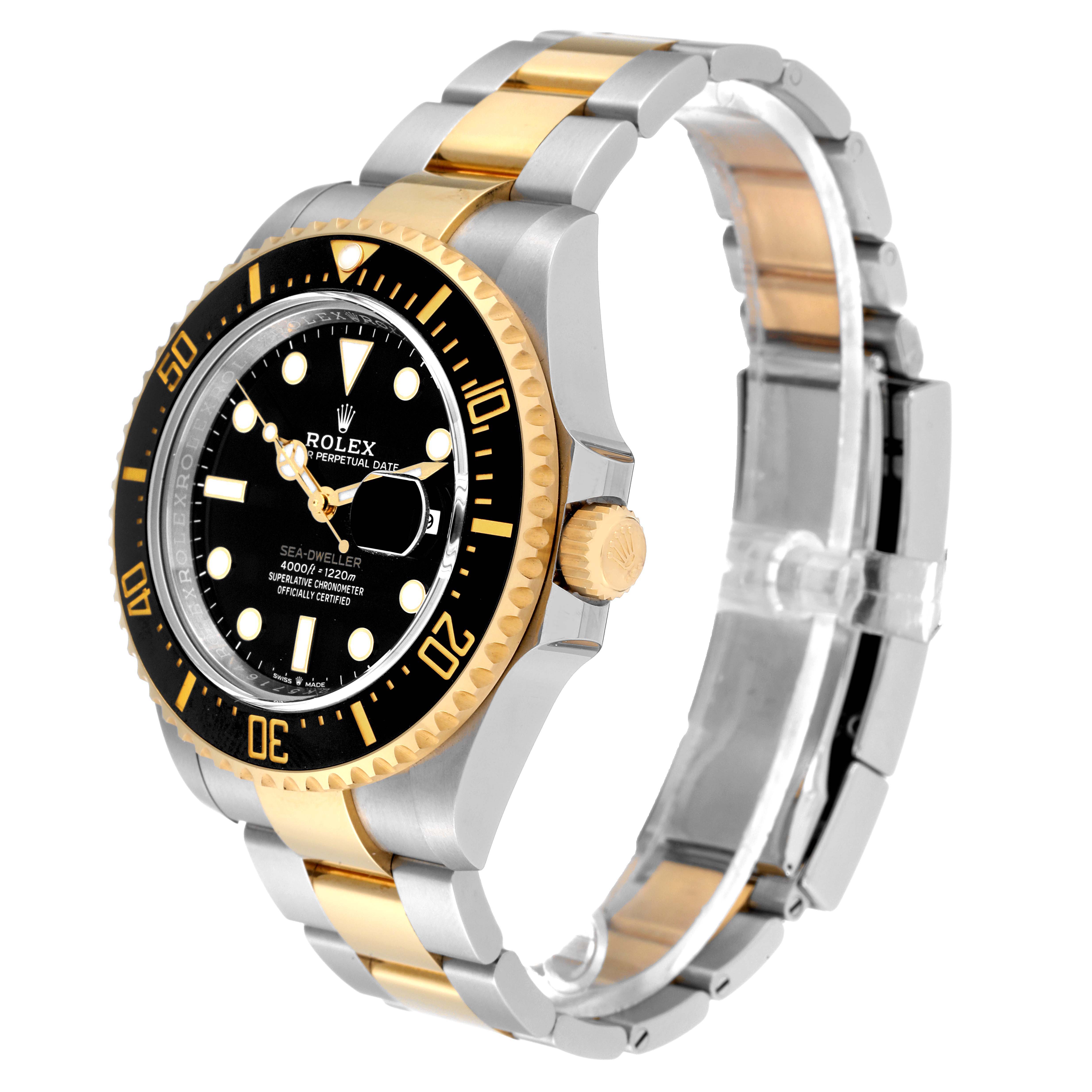The image shows a side angle of a Rolex Sea-Dweller 126603 Men's Steel and Gold (two tone) Black Dial 126603 Men's Steel and Gold (two tone) Black Dial watch, highlighting the bezel, crown, and two-tone bracelet.