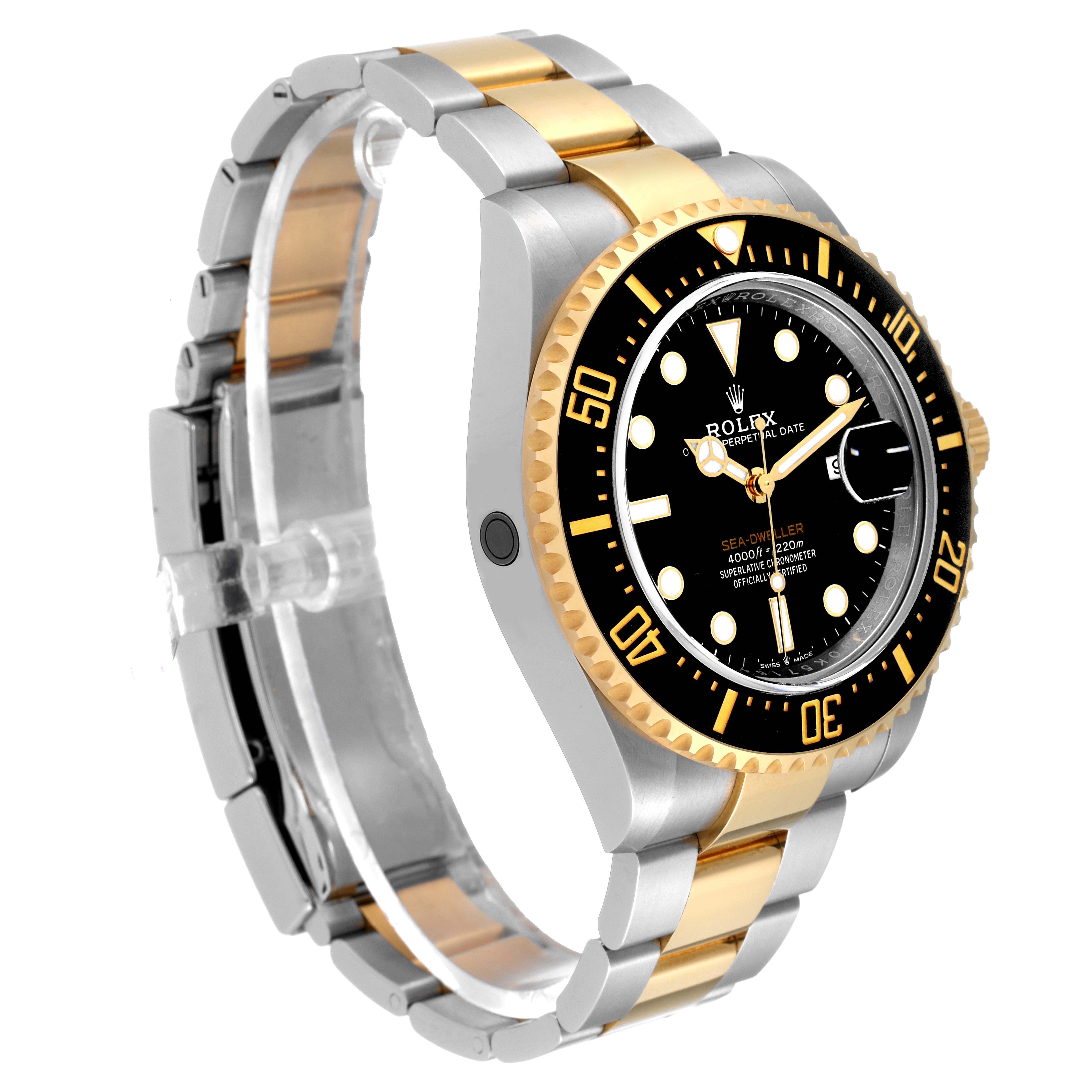 The image shows a side angle of the Rolex Sea-Dweller 126603 Men's Steel and Gold (two tone) Black Dial 126603 Men's Steel and Gold (two tone) Black Dial watch, highlighting its bezel, dial, and two-tone metal bracelet.