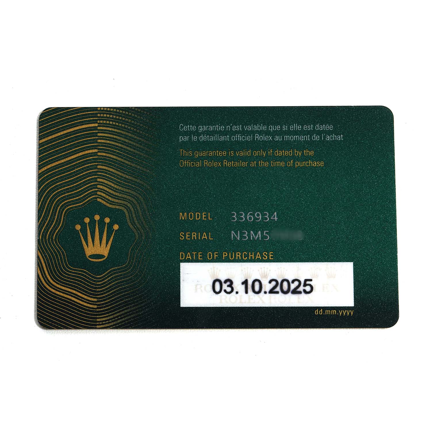 The image shows a guarantee card for the Rolex Sky-Dweller 336934 Men's Stainless Steel Green Dial, detailing model, serial number, and purchase date.