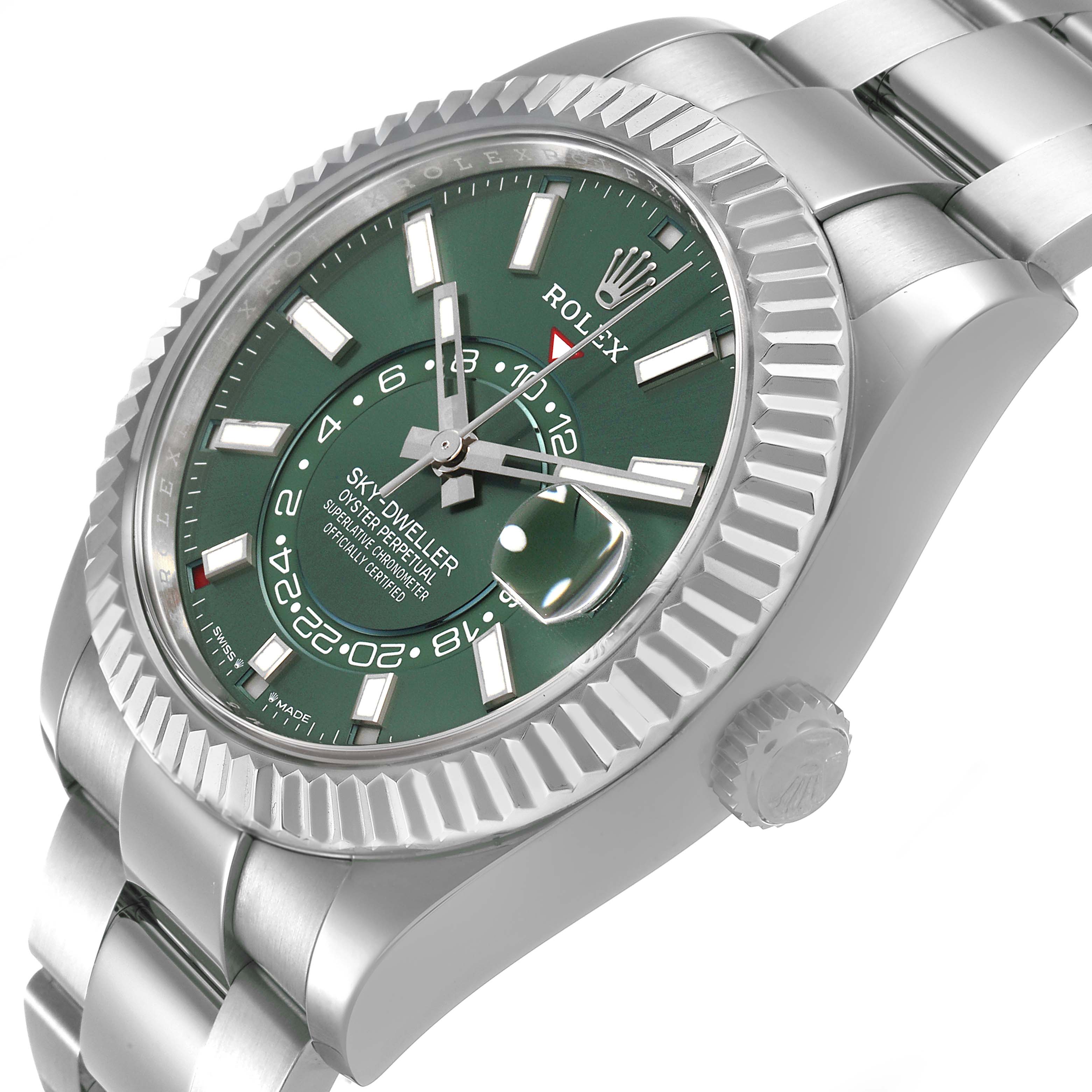 The image shows a Rolex Sky-Dweller 336934 Men's Stainless Steel Green Dial at a slight angle, highlighting the green dial, fluted bezel, and part of the bracelet.