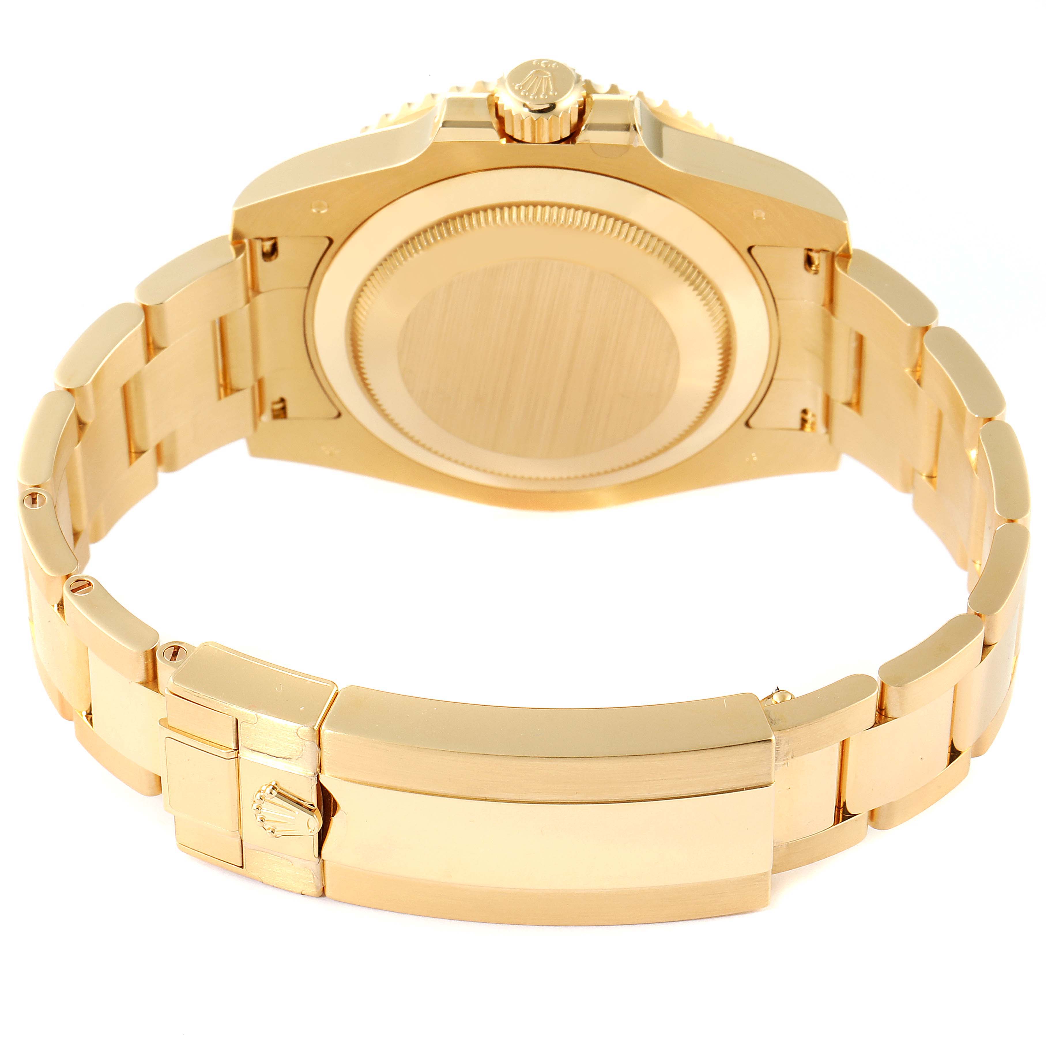 The image shows the back view of a Rolex Submariner 116613 Men's Yellow Gold Black Dial 116613 Men's Yellow Gold Black Dial watch, displaying the case back and the bracelet with the clasp.