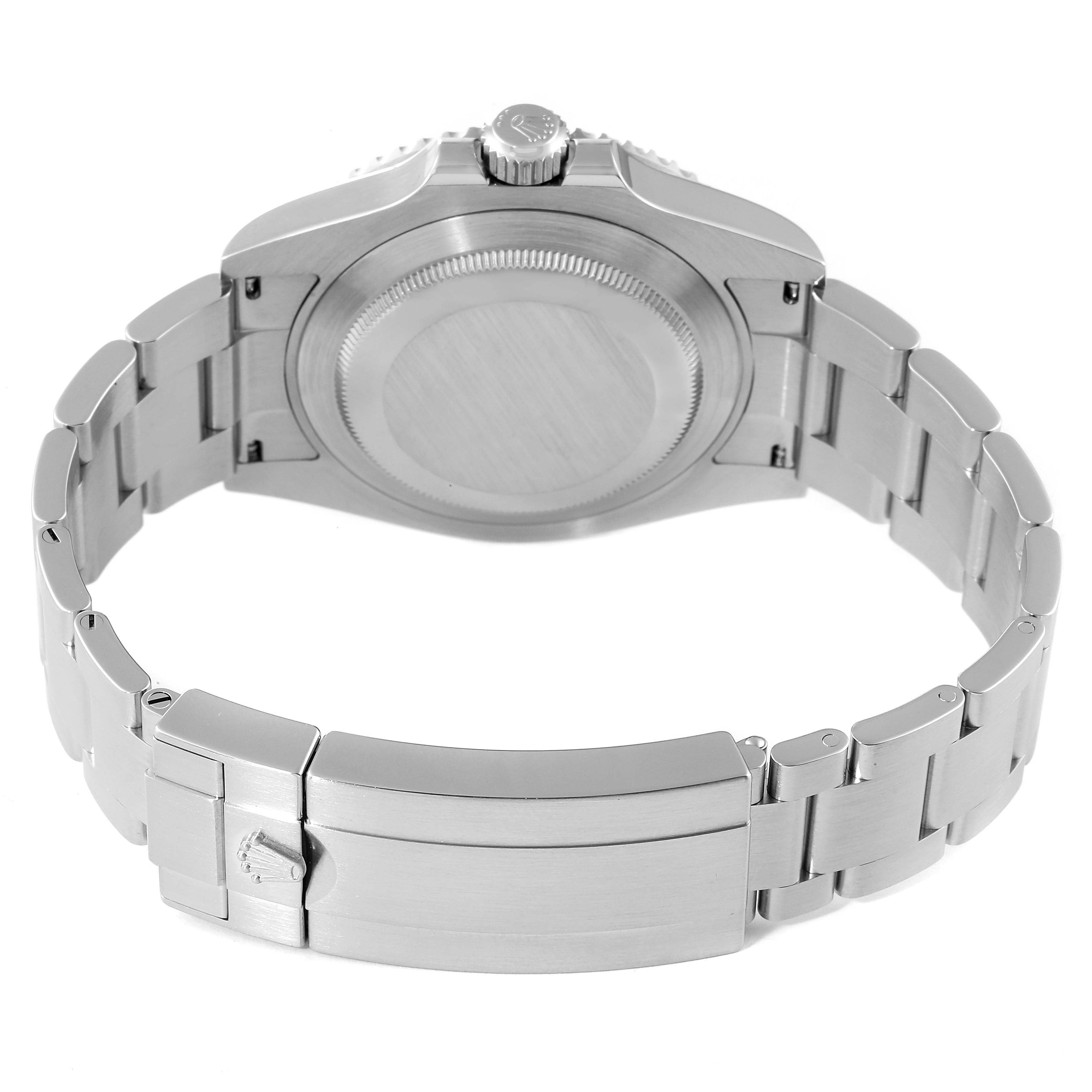 The image shows the back view of a Rolex Submariner 126610LN Men
s Stainless Steel Black Dial 126610LN Men
s Stainless Steel Black Dial watch, focusing on its case back and metal bracelet with clasp.